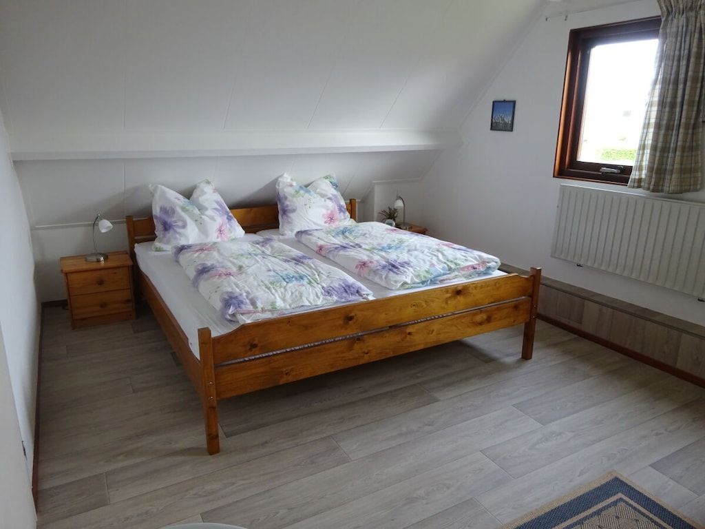 Een slaapkamer van 394165 in Ouddorp Zh