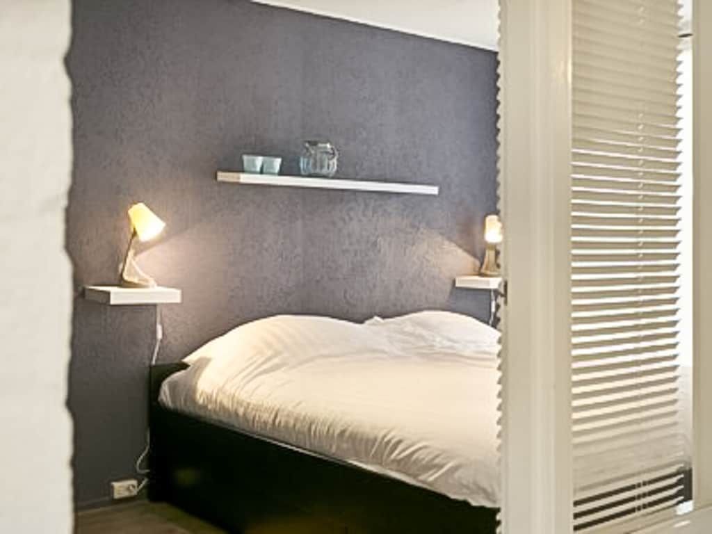 Een slaapkamer van 91078 in Ouddorp