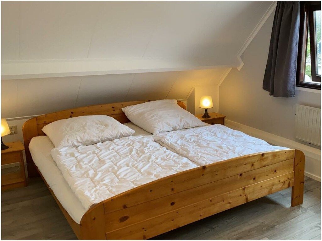 Een slaapkamer van 245443 in Ouddorp