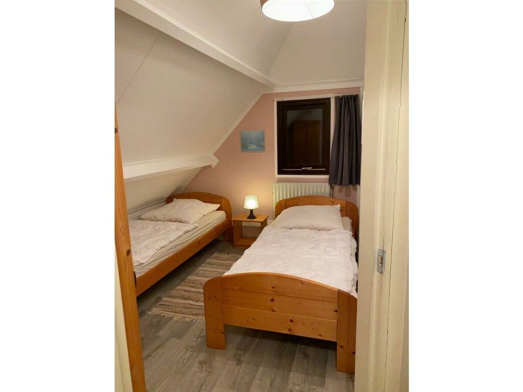 Een slaapkamer van 245443 in Ouddorp