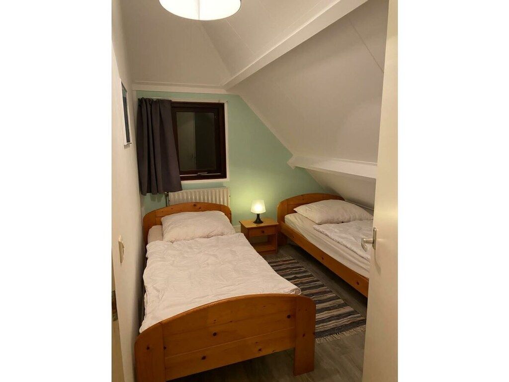 Een slaapkamer van 245443 in Ouddorp
