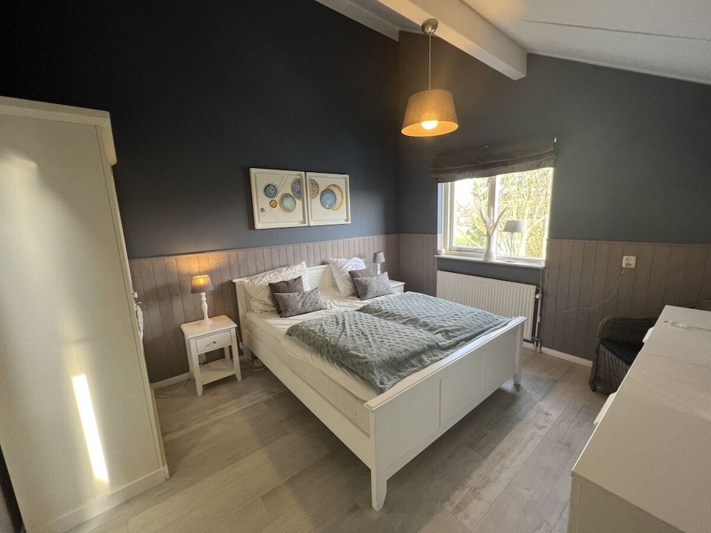 Een slaapkamer van 395671 in Julianadorp Niederlande