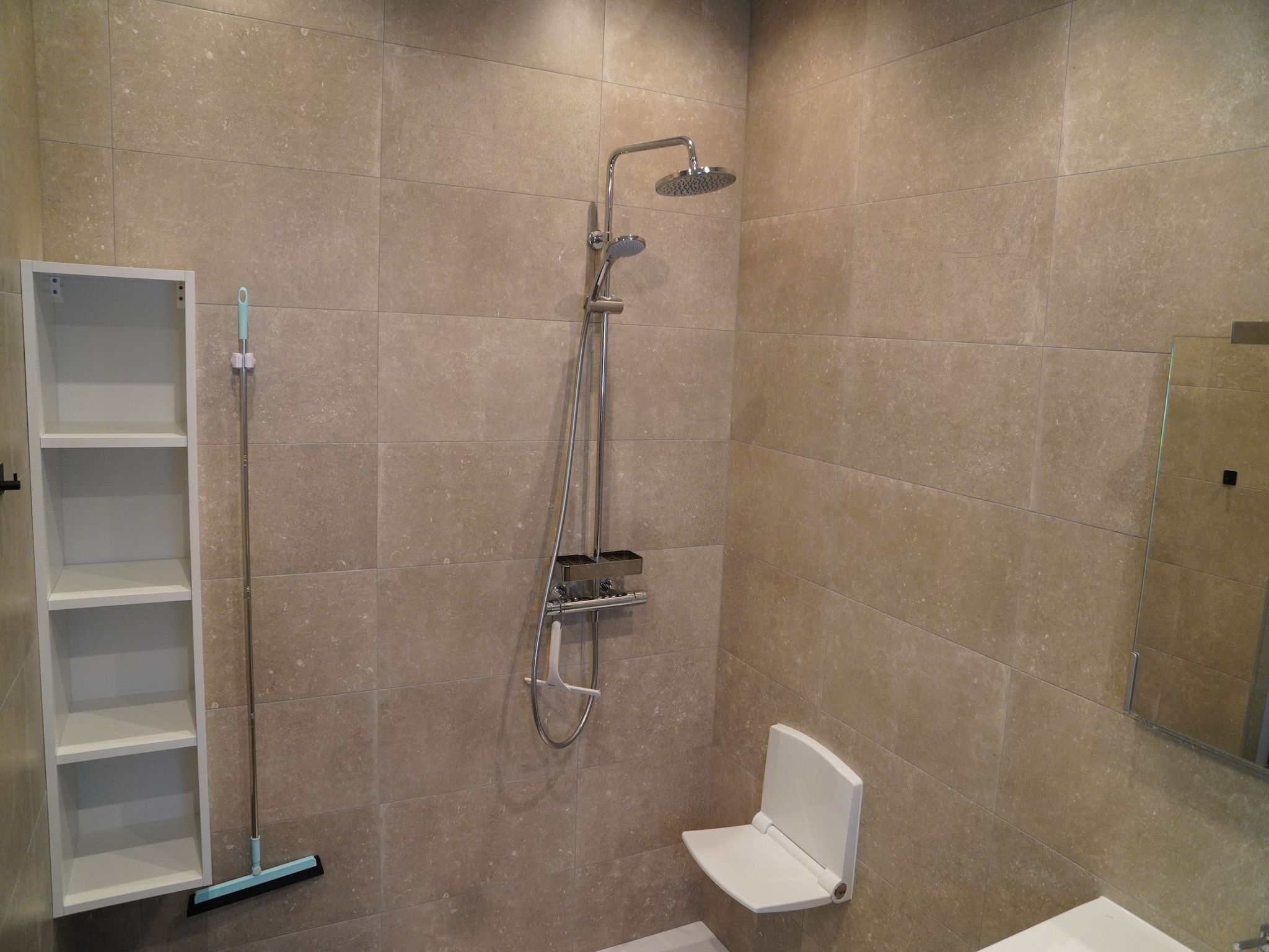 De badkamer van Vakantiepark De Rimboe & De Woeste Hoogte 25 in Hoenderloo