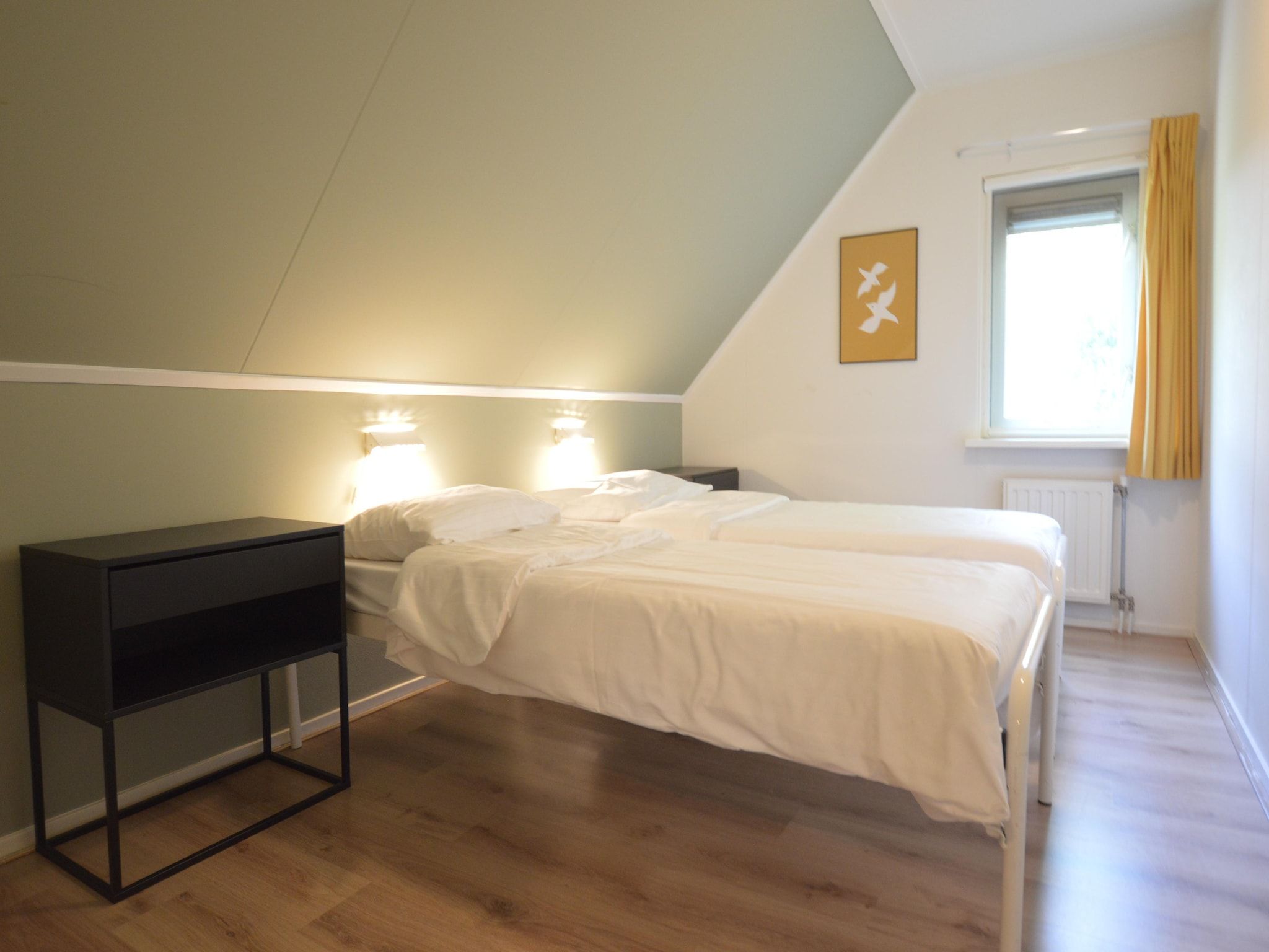 Een slaapkamer van Buitenplaats Berg en Bos nummer 43 in Overijssel