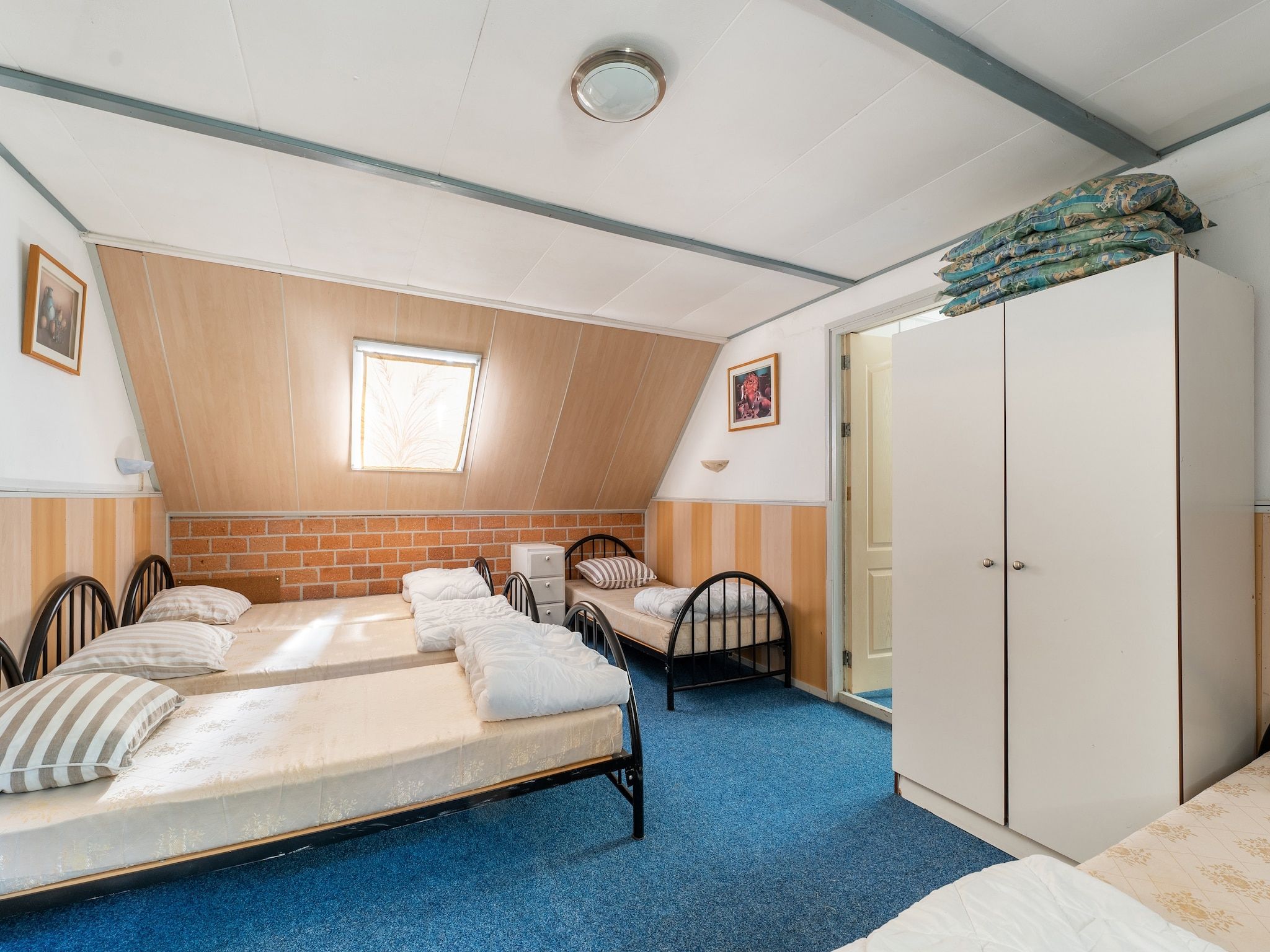 Een slaapkamer van Hoeve Ginette in Giethoorn