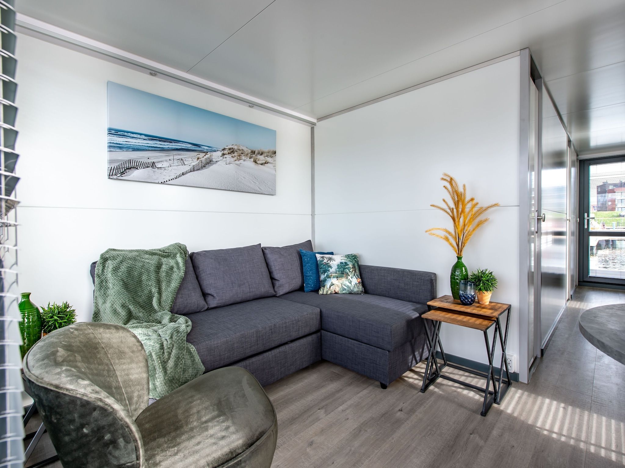 De woonkamer van Waterlodge Blue Lagoon in Kamperland