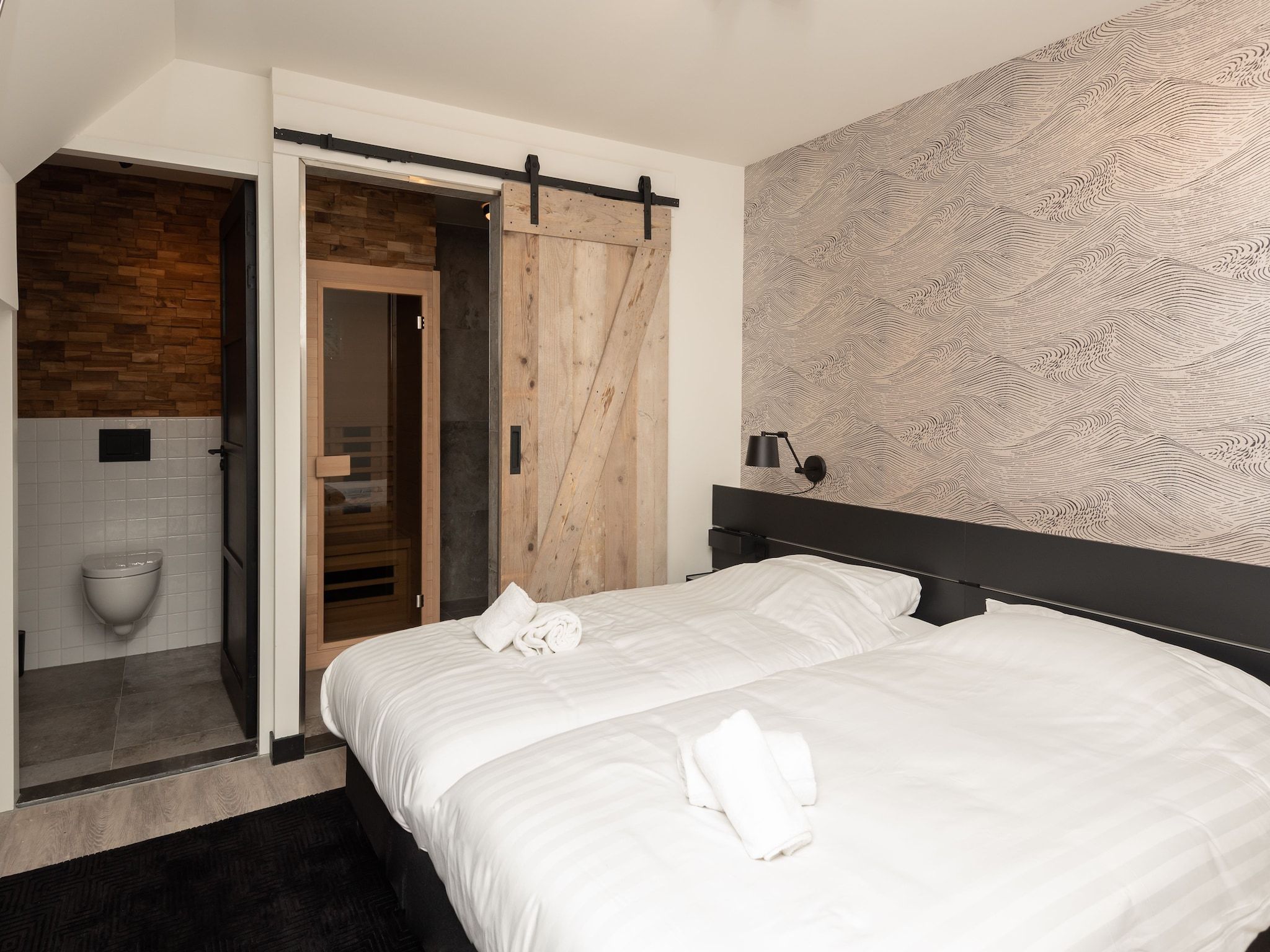 Een slaapkamer van Jan van Renesseweg 1 - 2 pers in Renesse