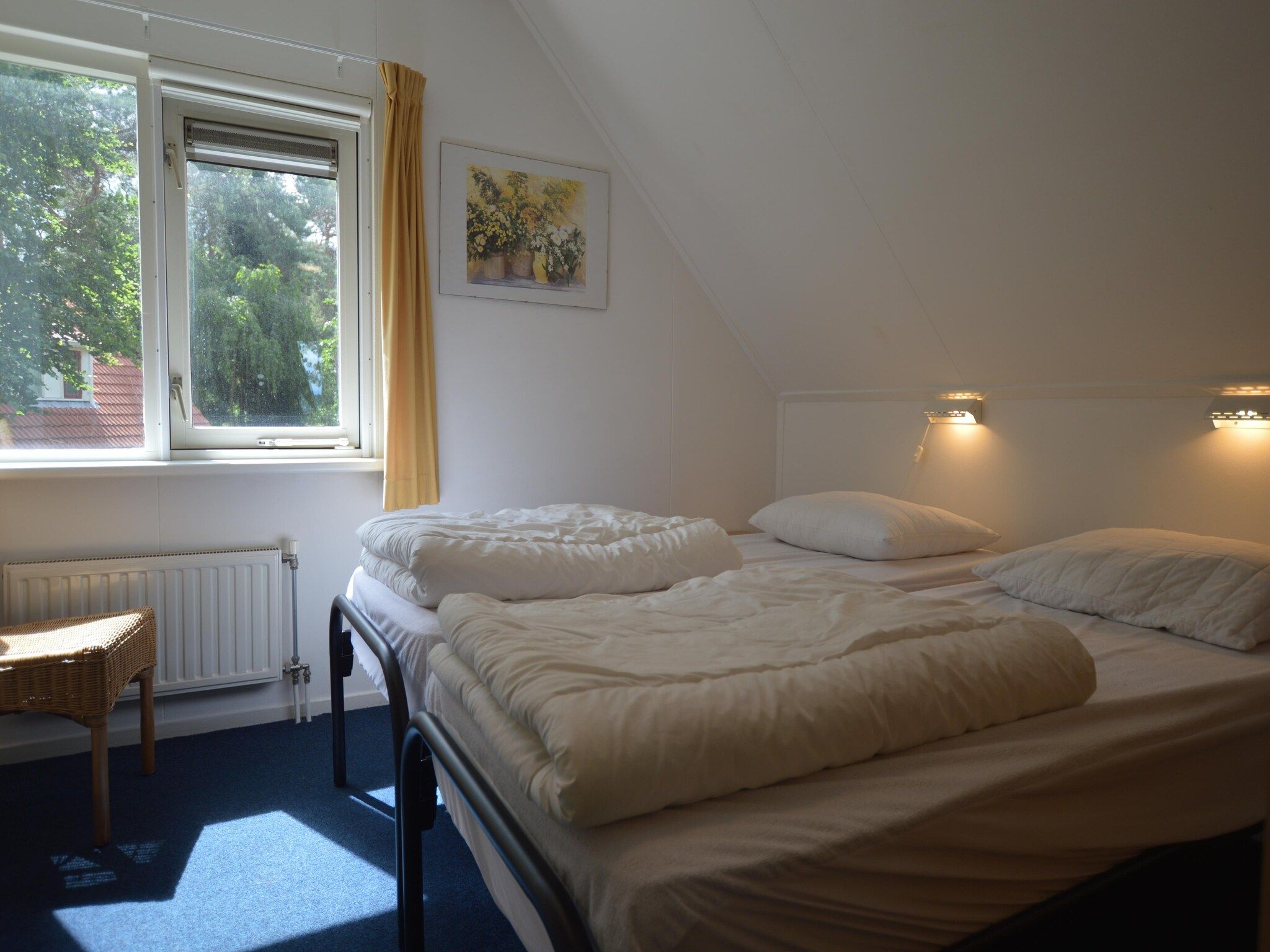 Een slaapkamer van Buitenplaats Berg en Bos nummer 18 in Lemele