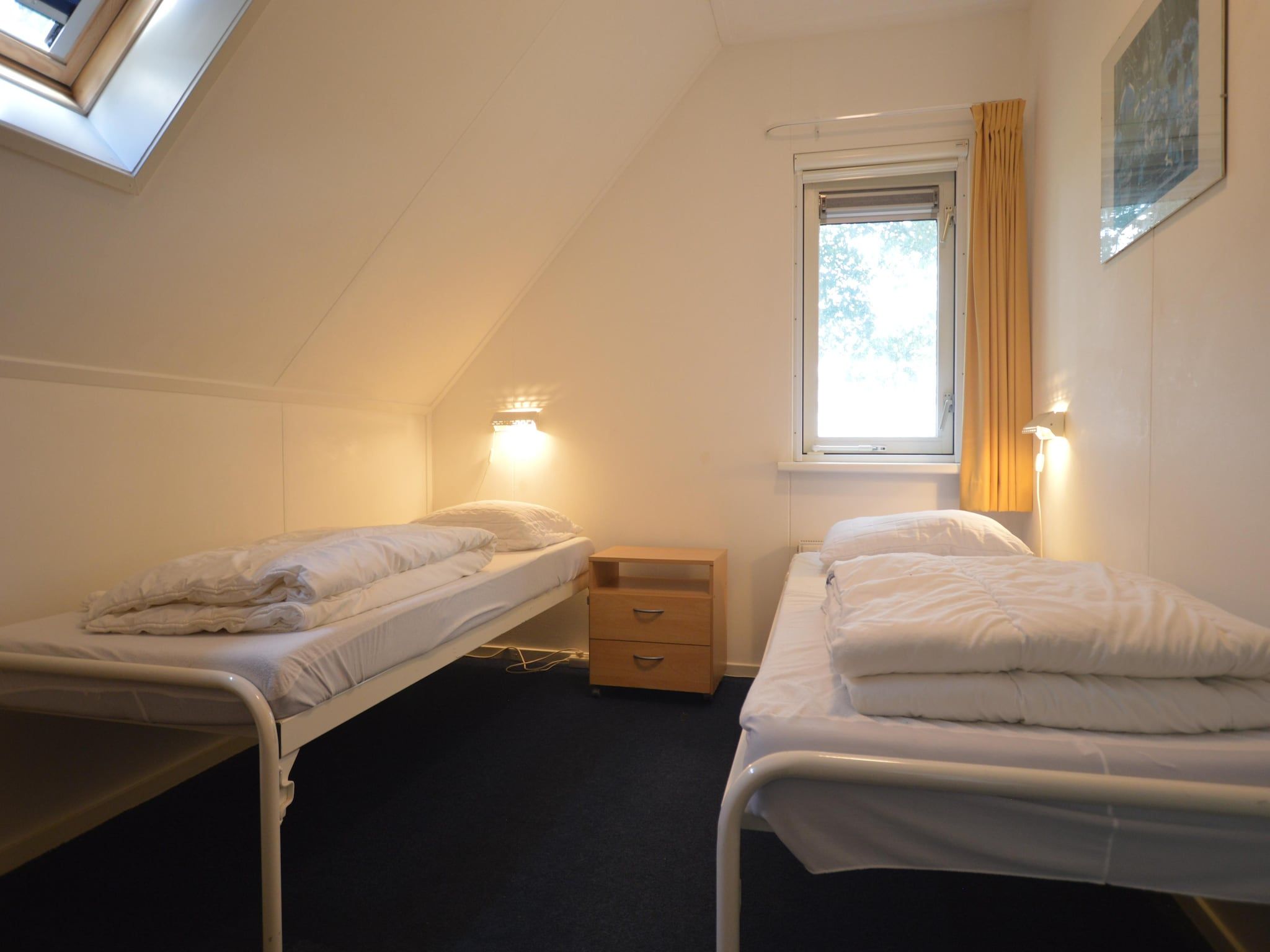 Een slaapkamer van Buitenplaats Berg en Bos nummer 18 in Lemele