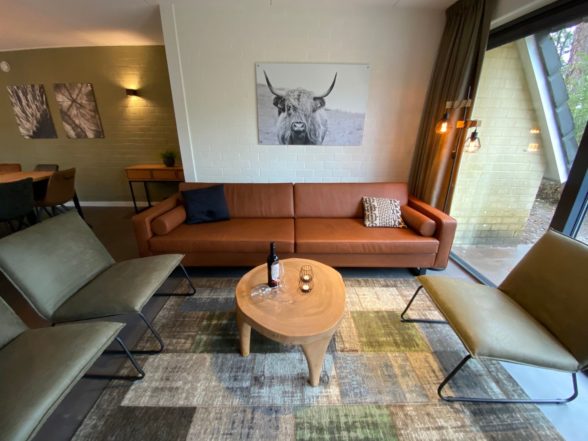 De woonkamer van Vakantiepark de Katjeskelder 21 in Oosterhout