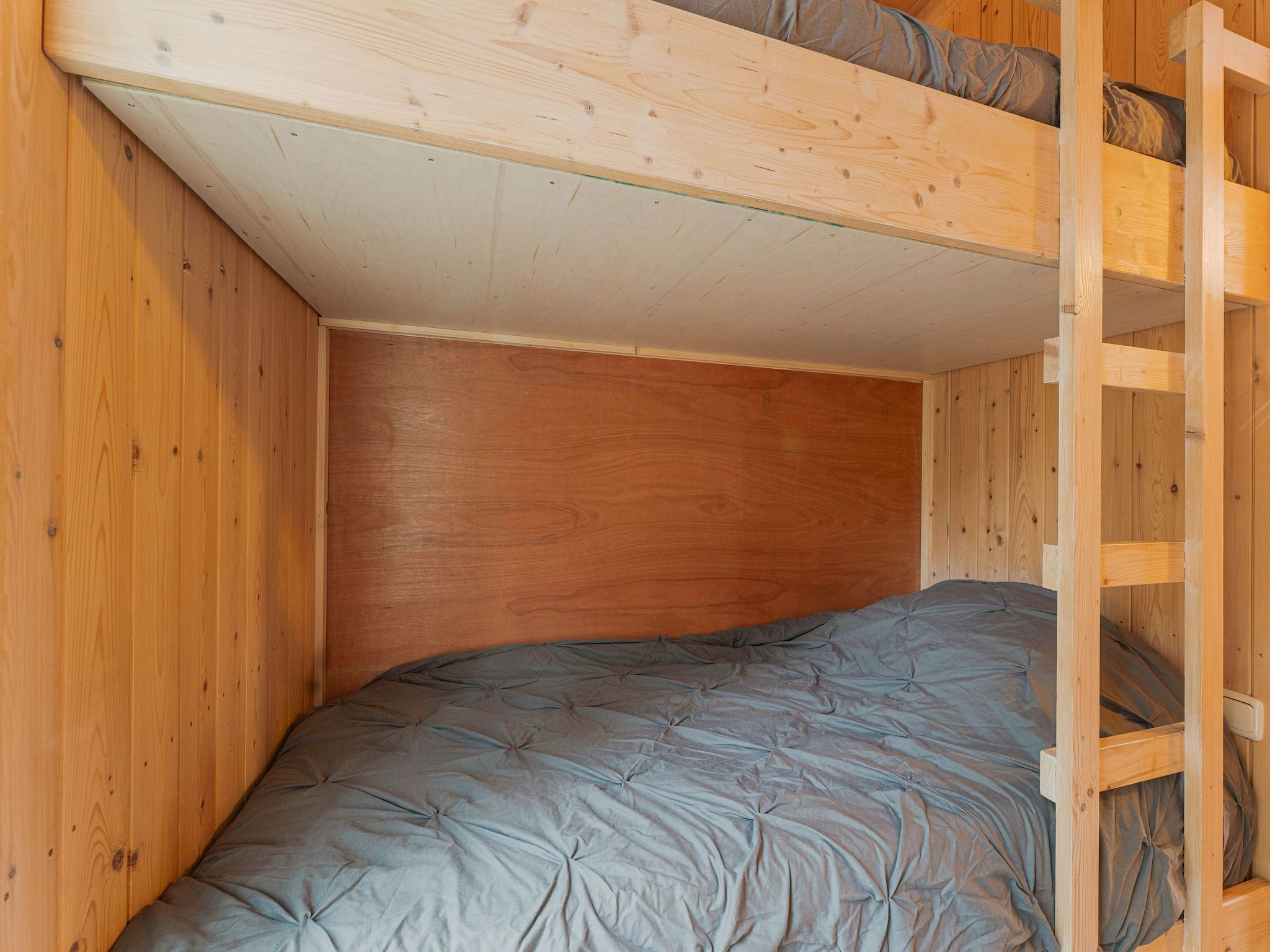 Een slaapkamer van Boshuis De Klim in Norg