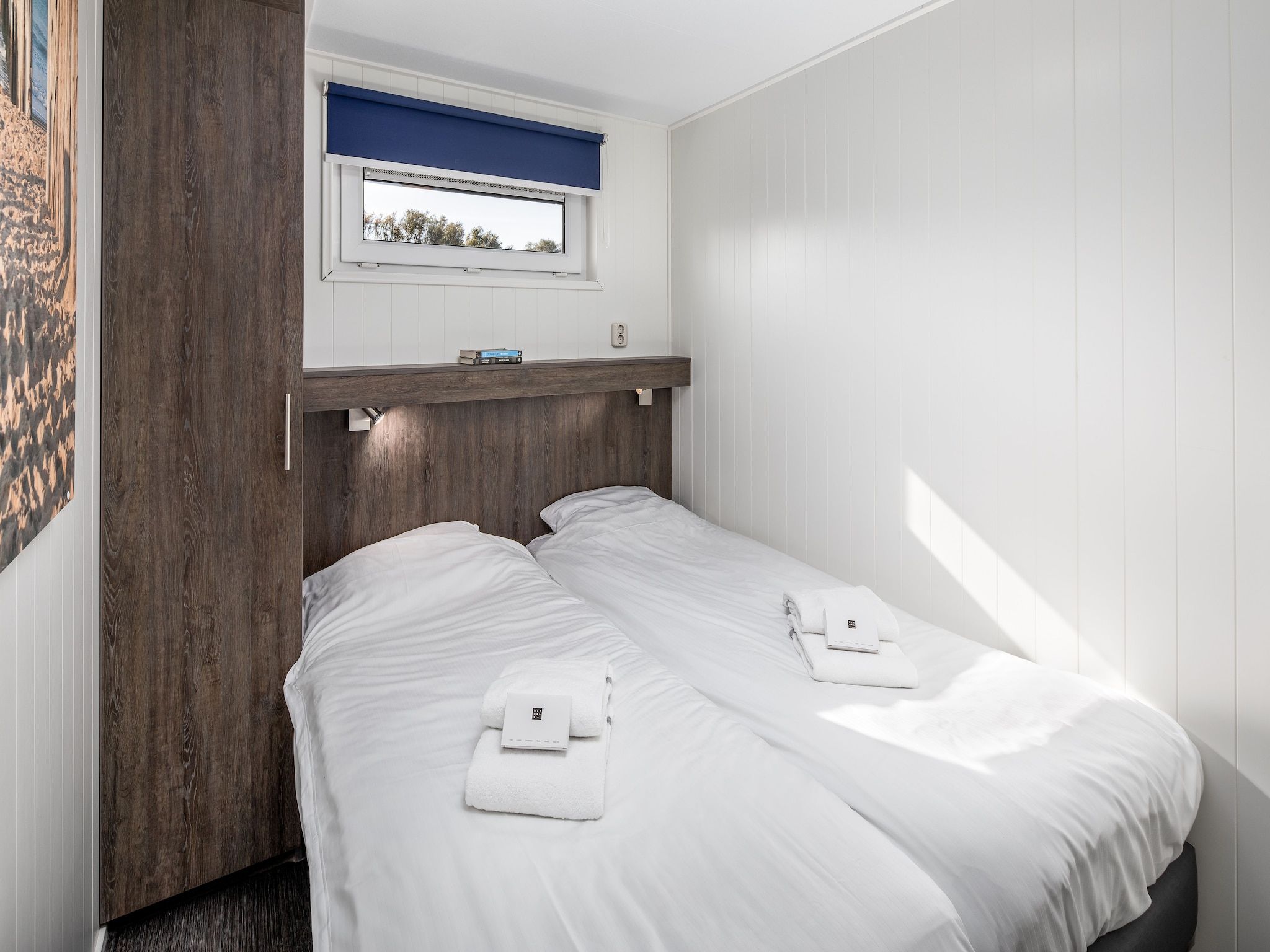 Een slaapkamer van Vakantiepark Beach Resort 24 in Kamperland