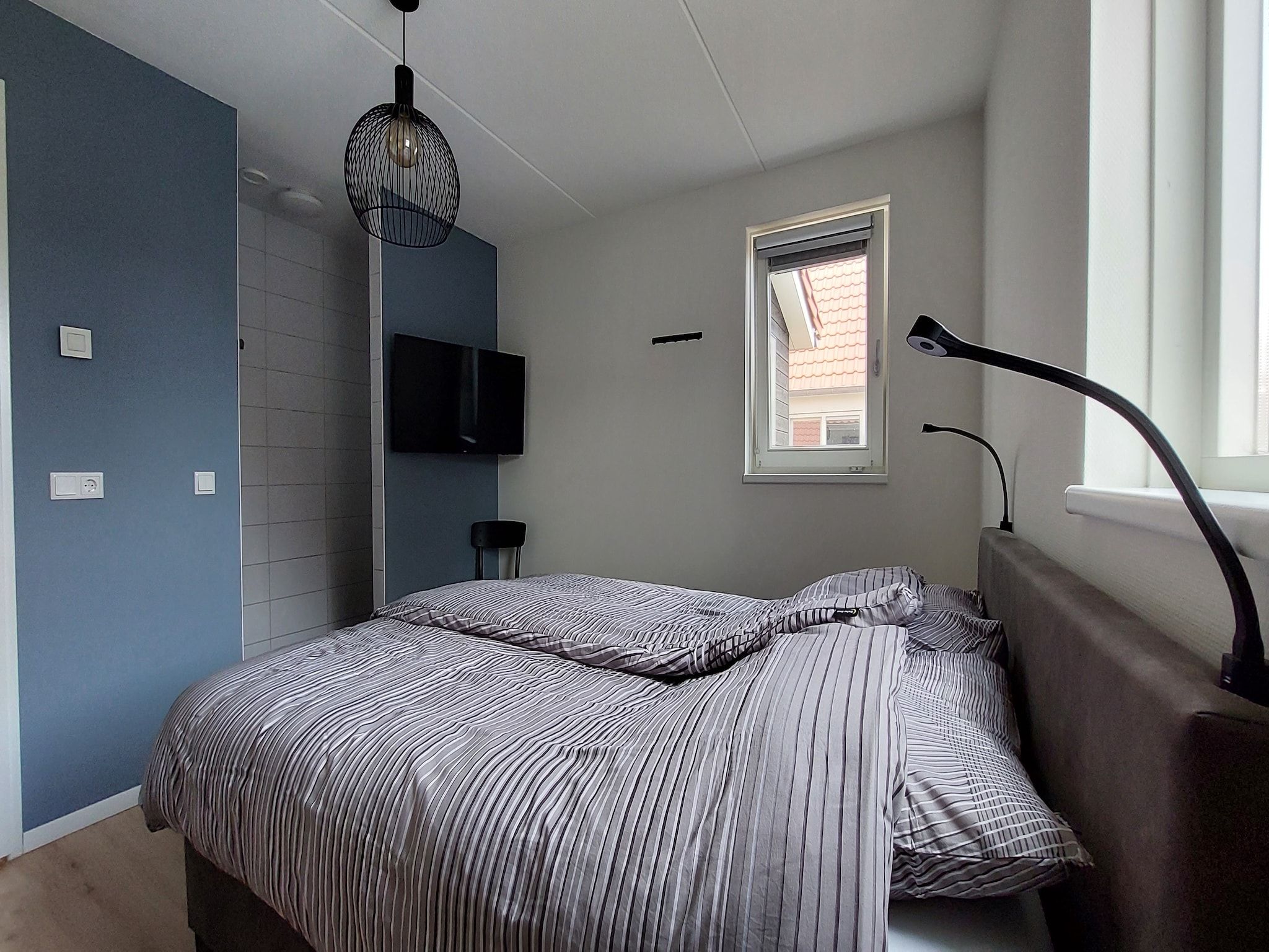 Een slaapkamer van De Meerkoet Huis Nr 37 in Scherpenisse