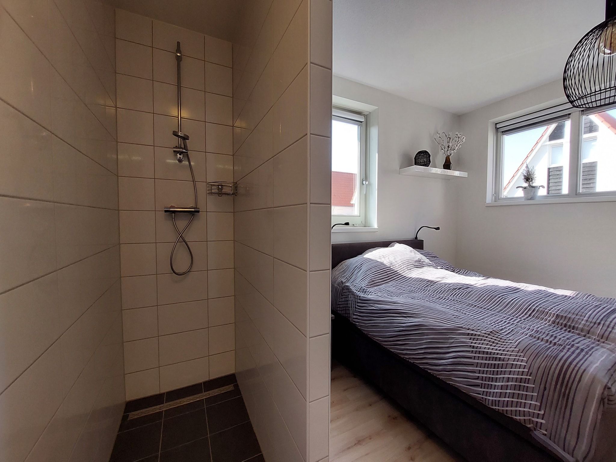 Een slaapkamer van De Meerkoet Huis Nr 37 in Scherpenisse