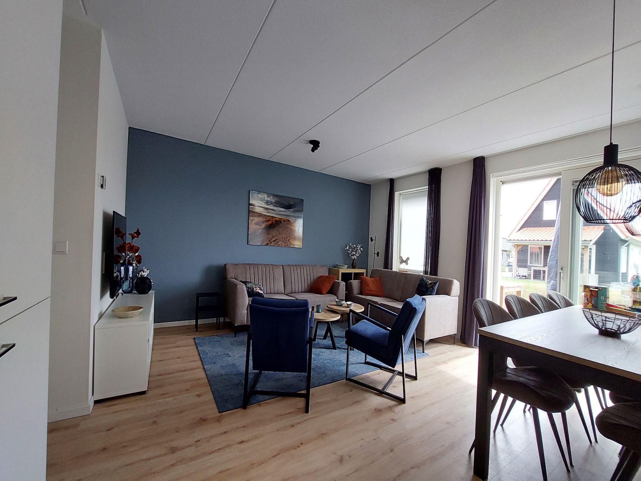 De woonkamer van De Meerkoet Huis Nr 37 in Scherpenisse