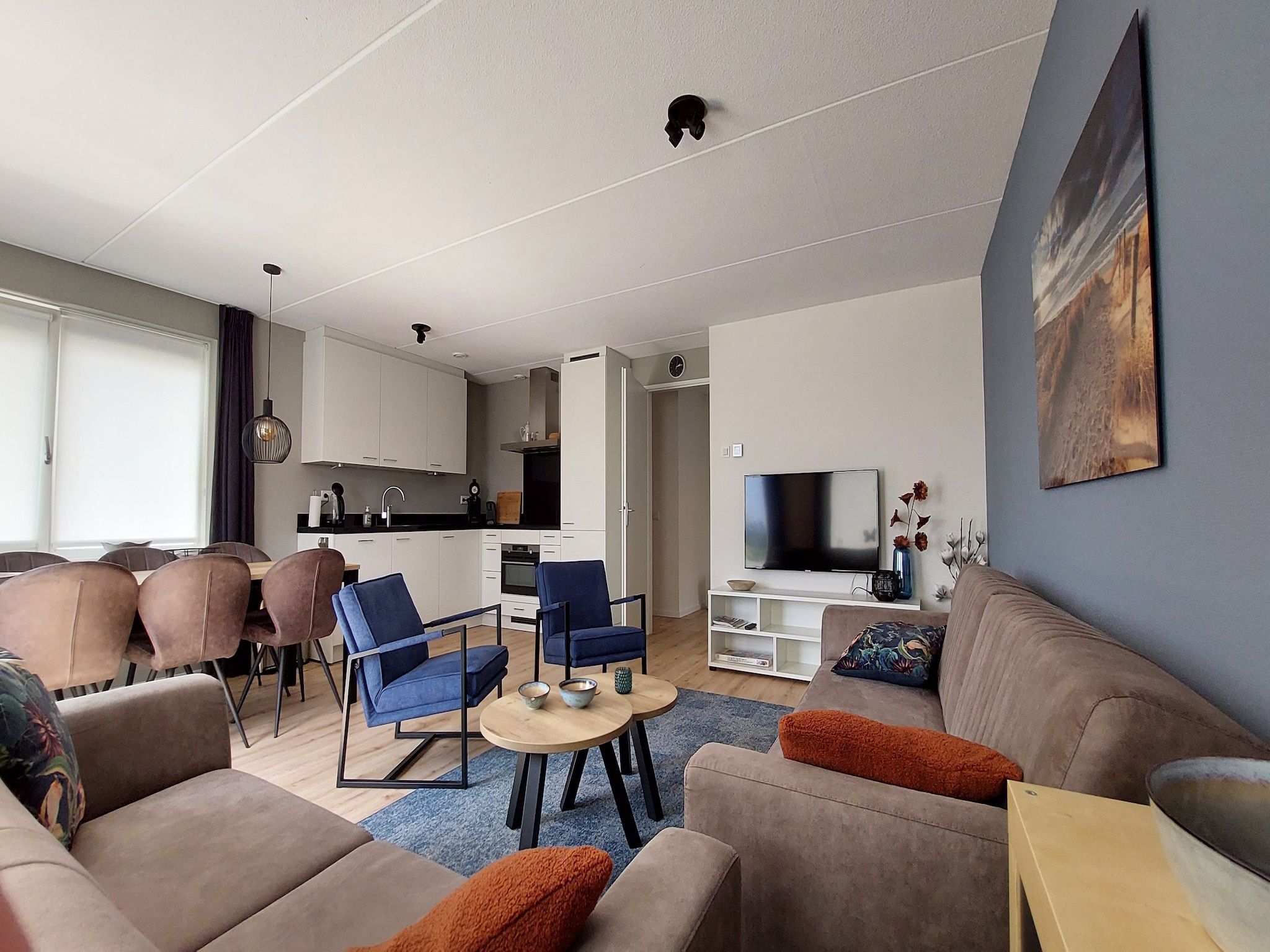 De woonkamer van De Meerkoet Huis Nr 37 in Scherpenisse