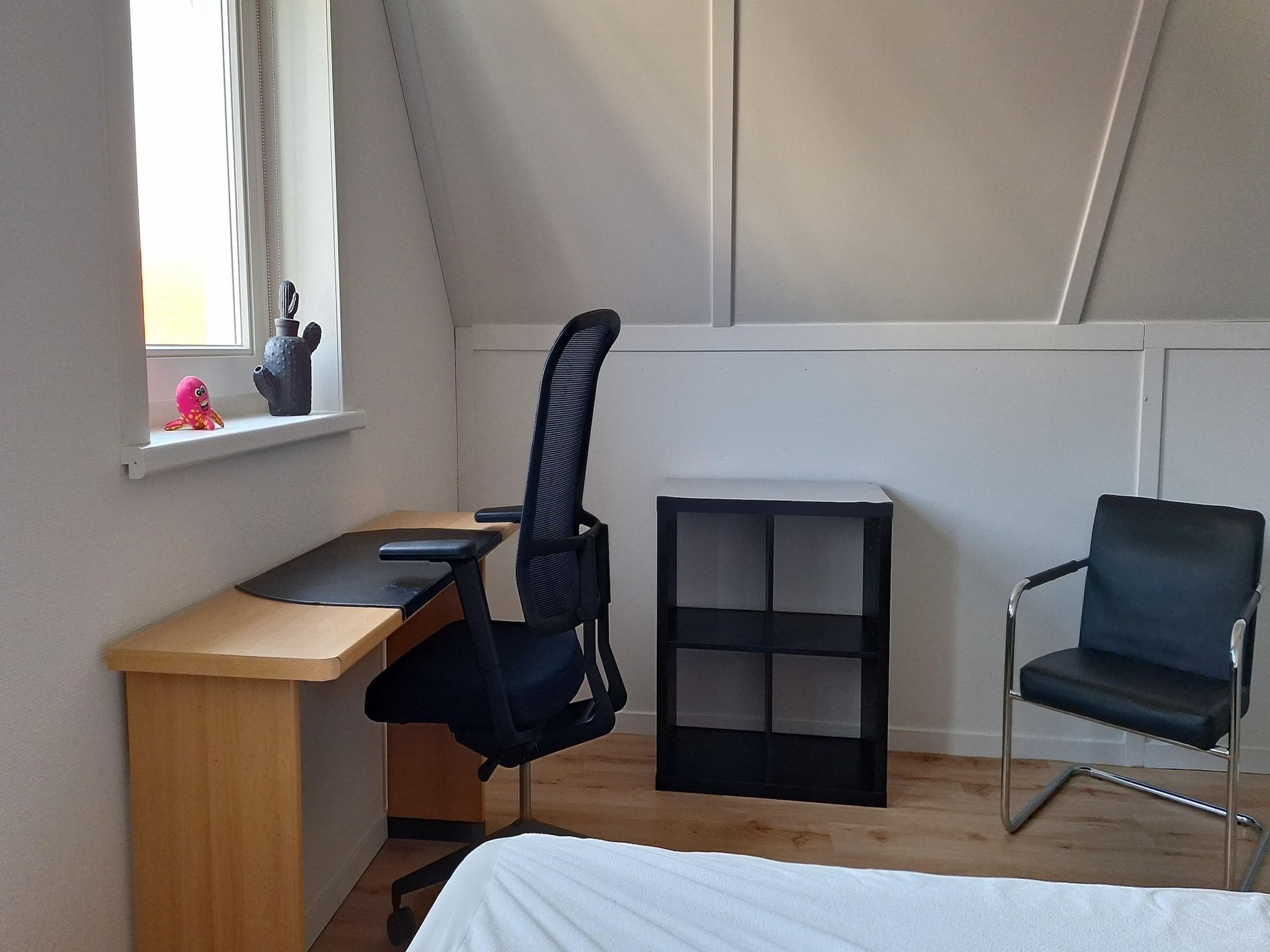 Een slaapkamer van De Meerkoet Huis Nr 37 in Scherpenisse