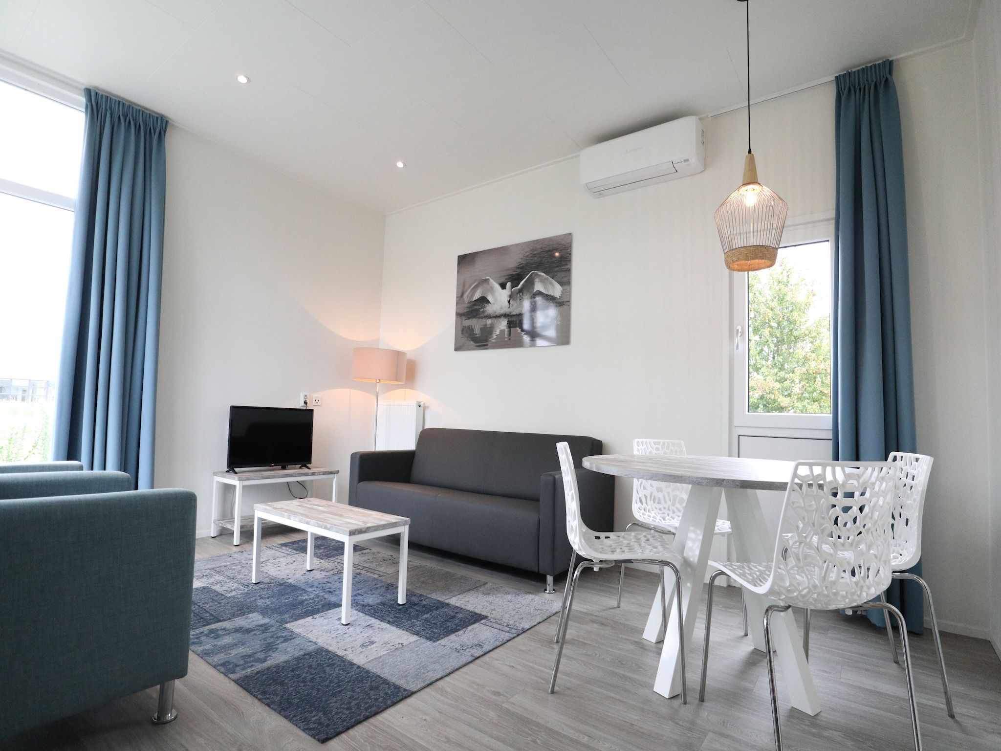 De woonkamer van Cube la Mer 4 in Olburgen