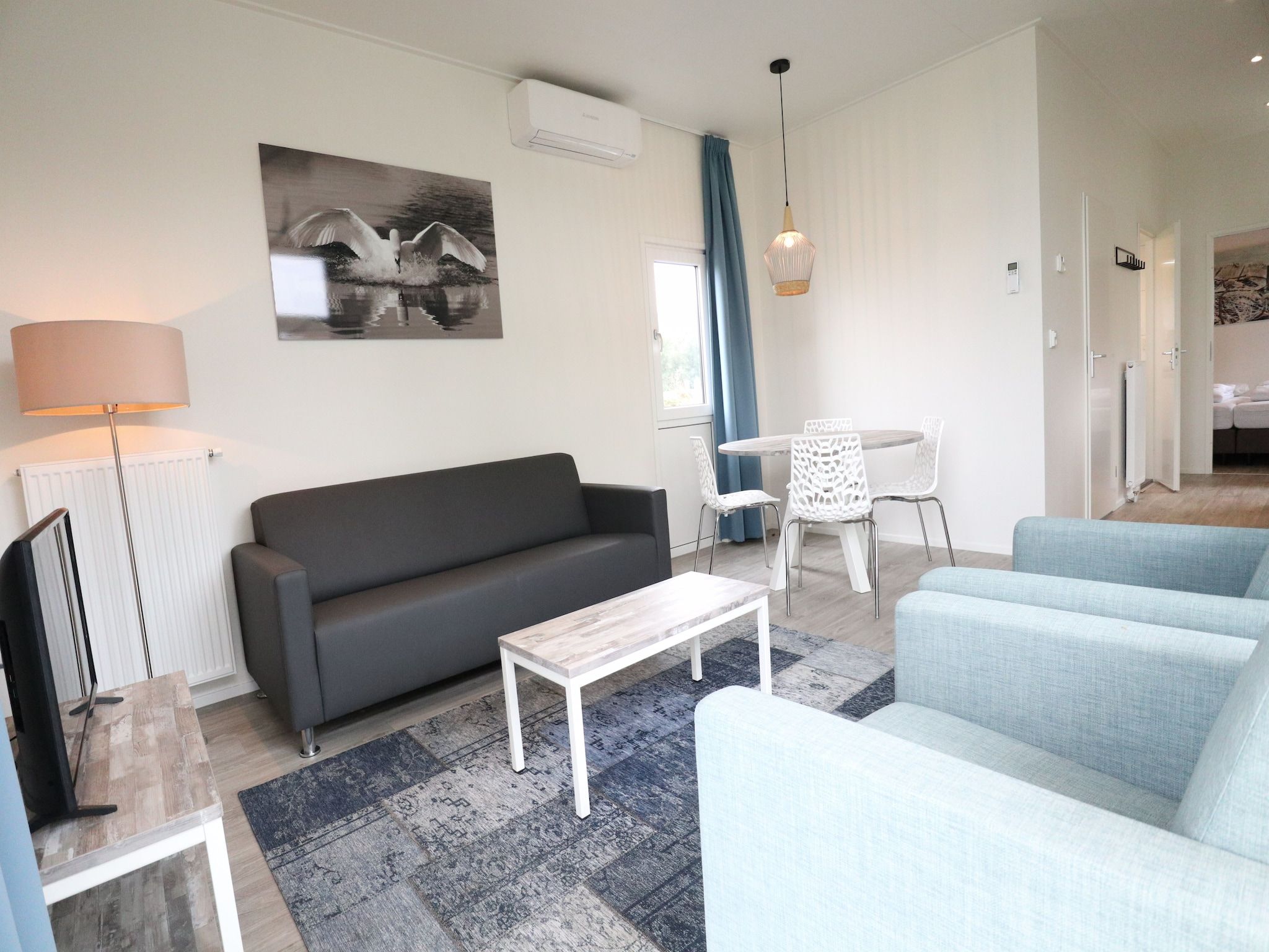 De woonkamer van Cube la Mer 4 in Olburgen