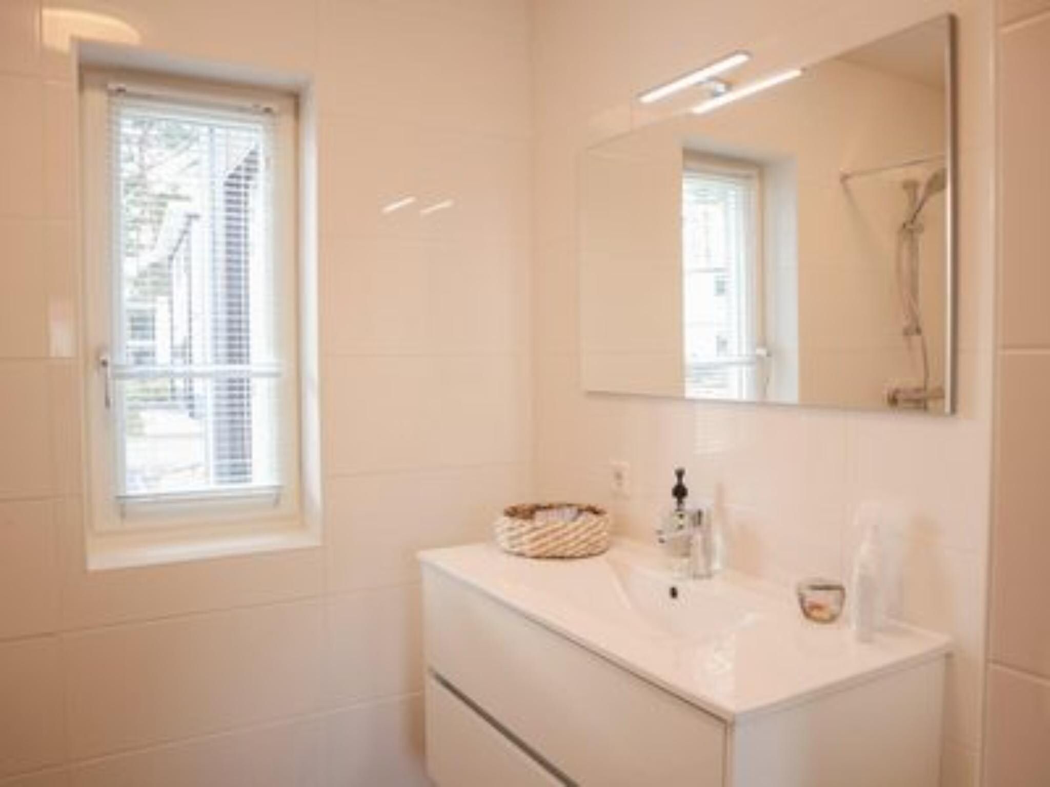De badkamer van Villa Wellness 4 in Otterlo