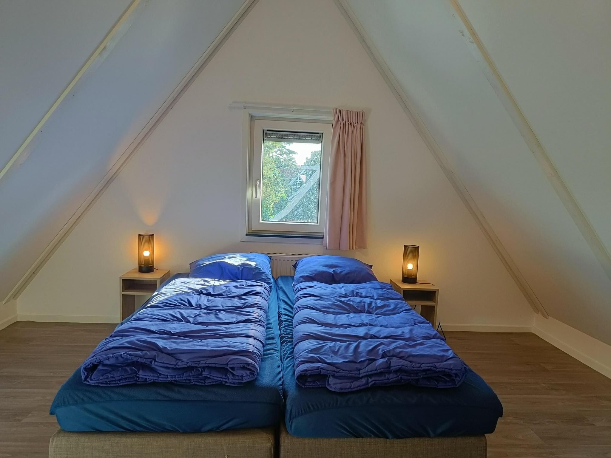 Een slaapkamer van Geheim van Otterlo 6 in Otterlo