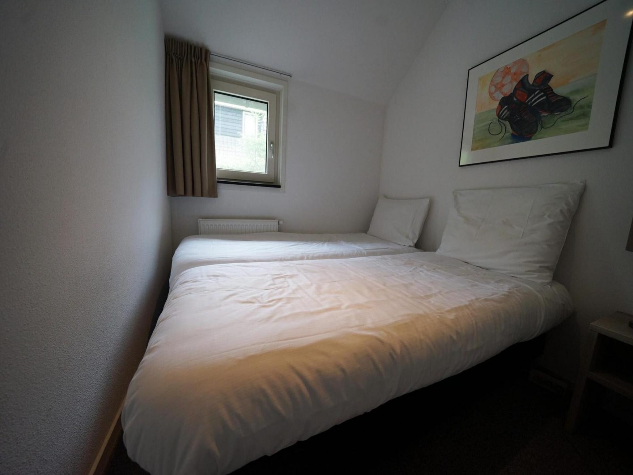 Een slaapkamer van Geheim van Otterlo 8 in Otterlo