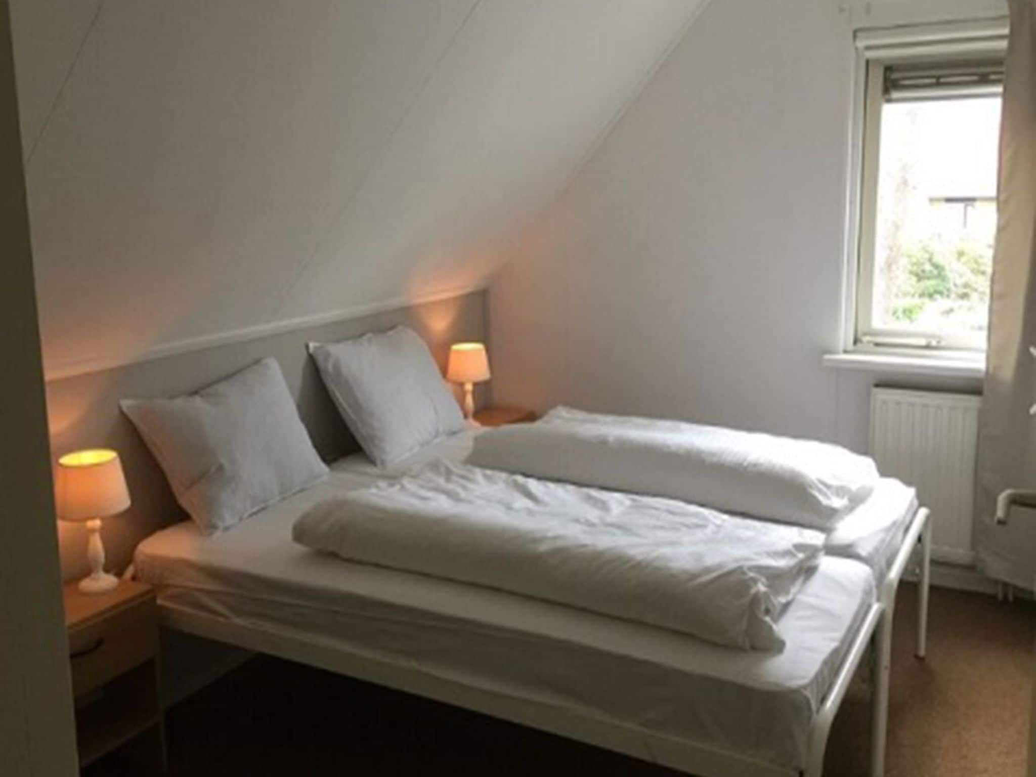 Een slaapkamer van Buitenplaats Berg en Bos nummer 4 in Lemele