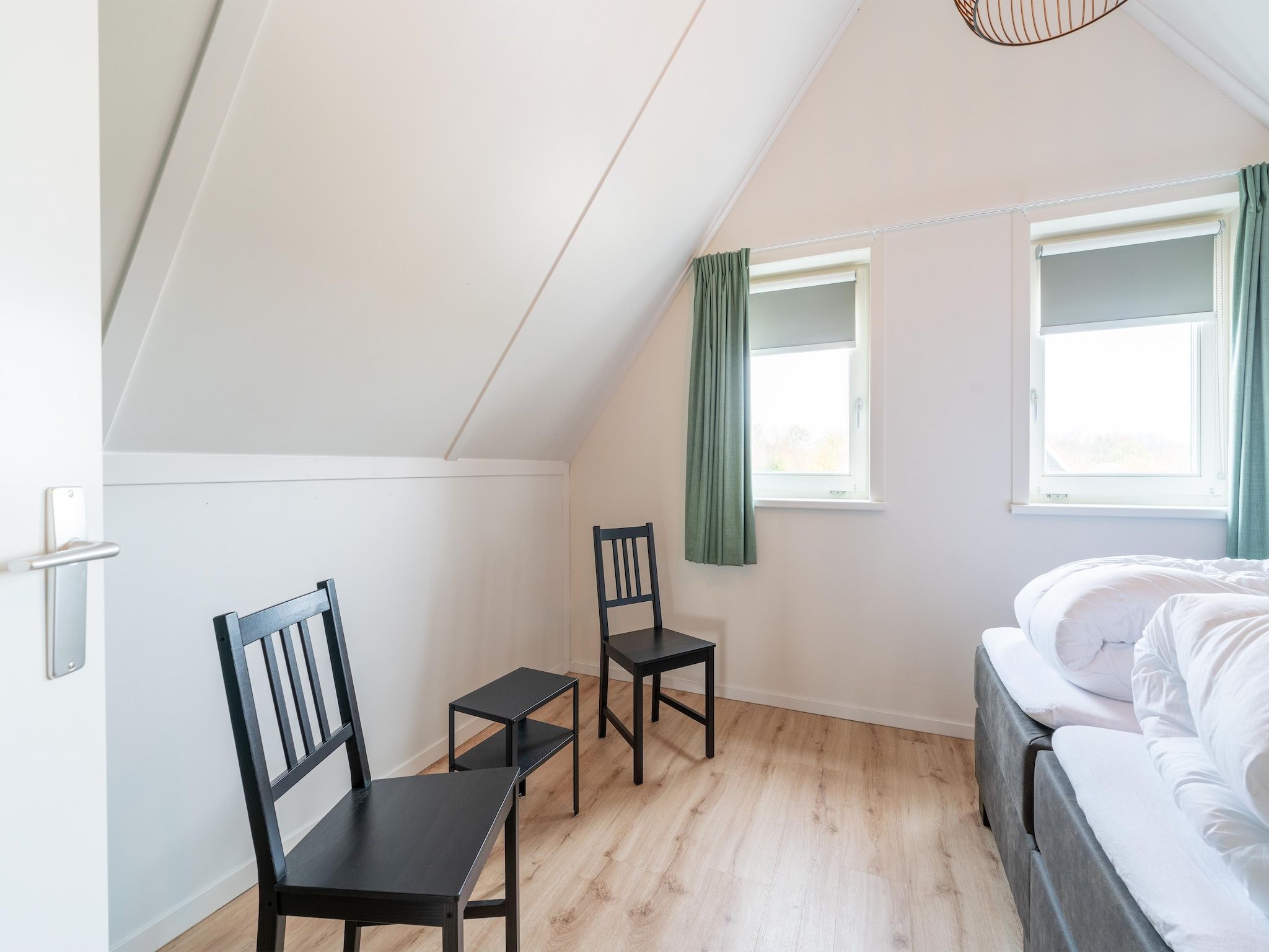 Een slaapkamer van De Botter Huis Nr 15 in Scherpenisse