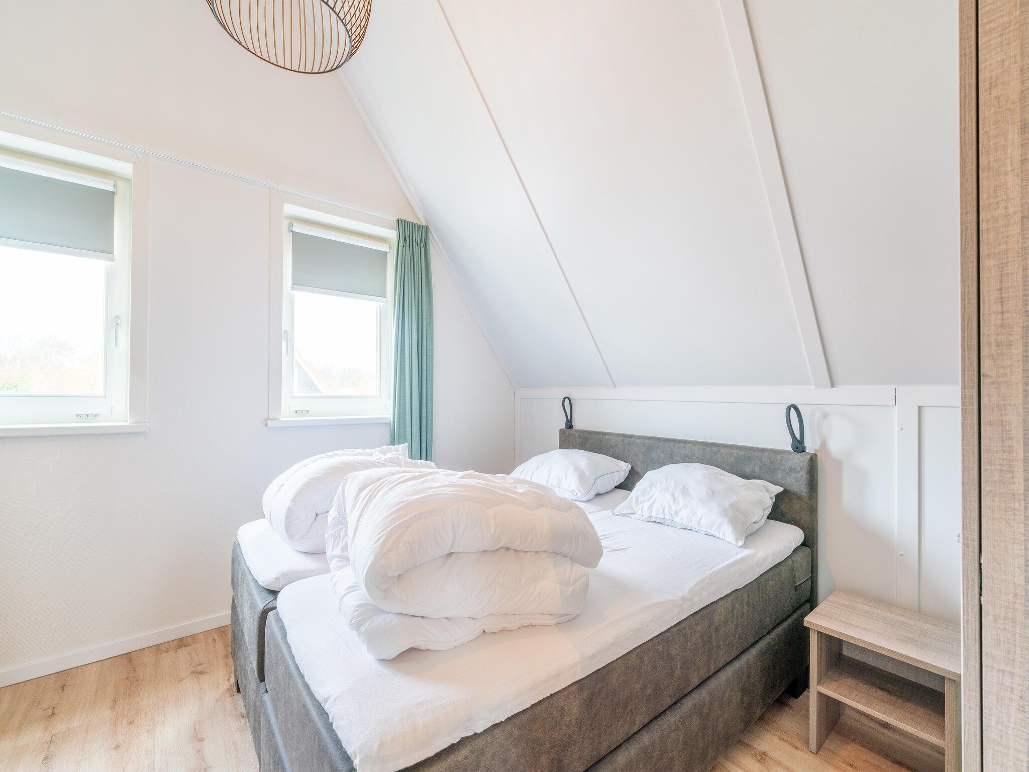 Een slaapkamer van De Botter Huis Nr 15 in Scherpenisse