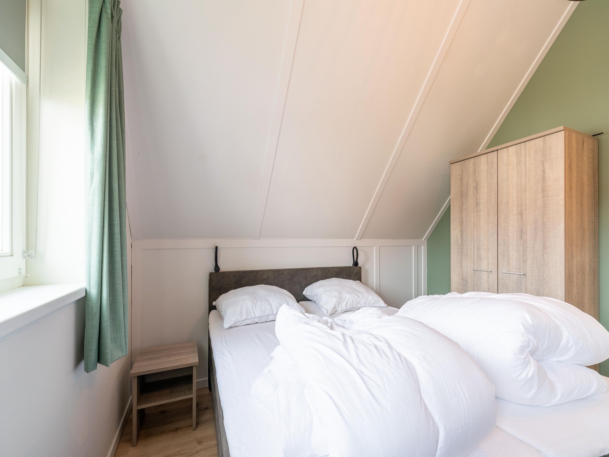 Een slaapkamer van De Botter Huis Nr 15 in Scherpenisse