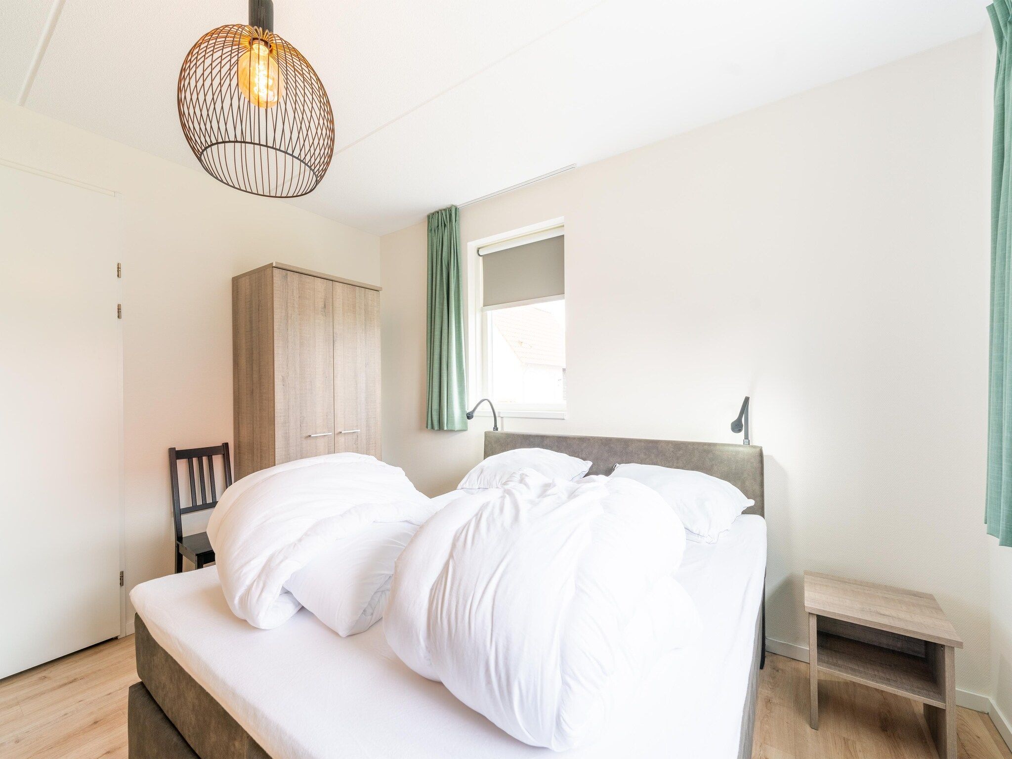 Een slaapkamer van De Botter Huis Nr 15 in Scherpenisse