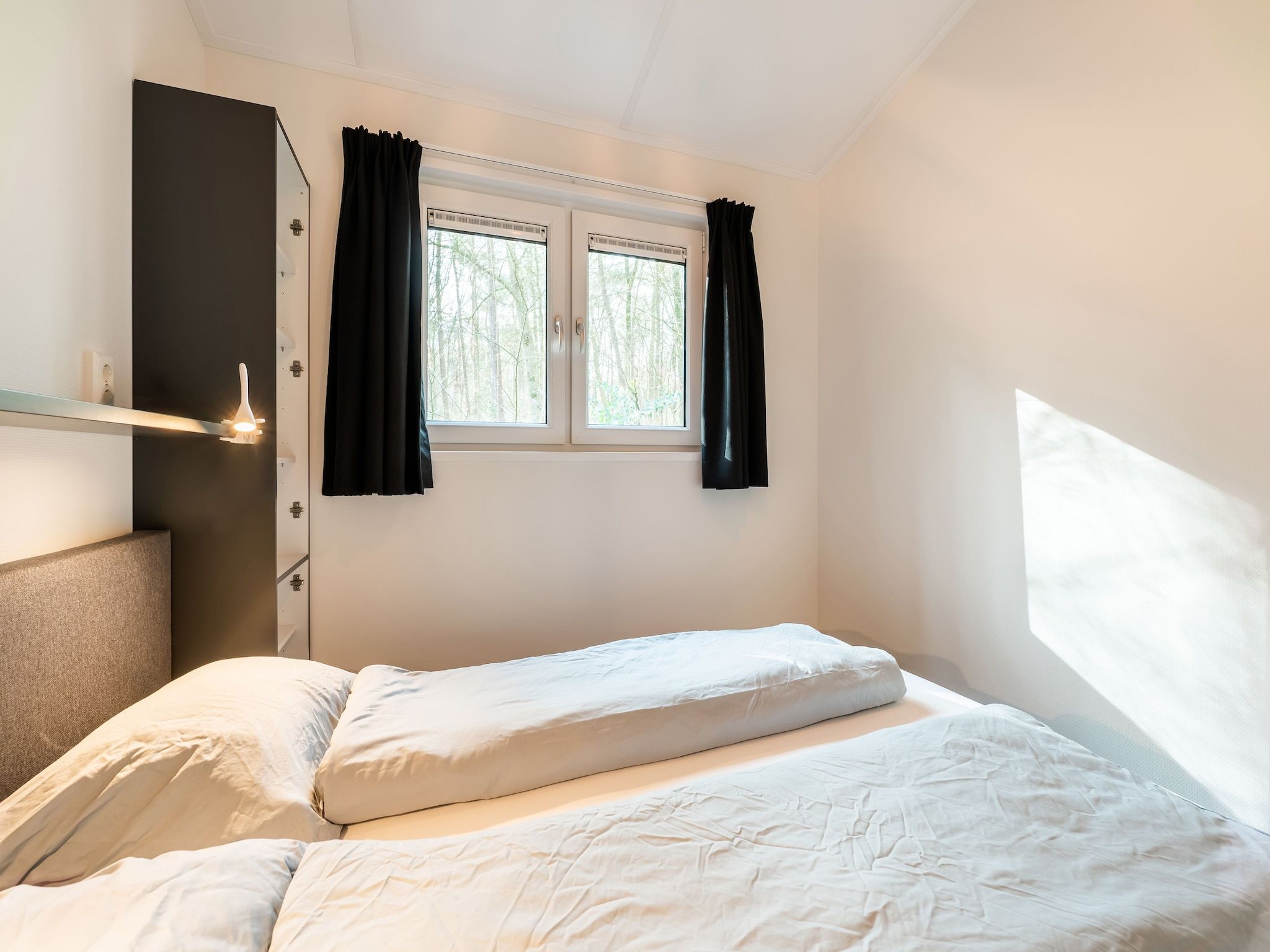 Een slaapkamer van De Hooischuur in Hellendoorn in Hellendoorn