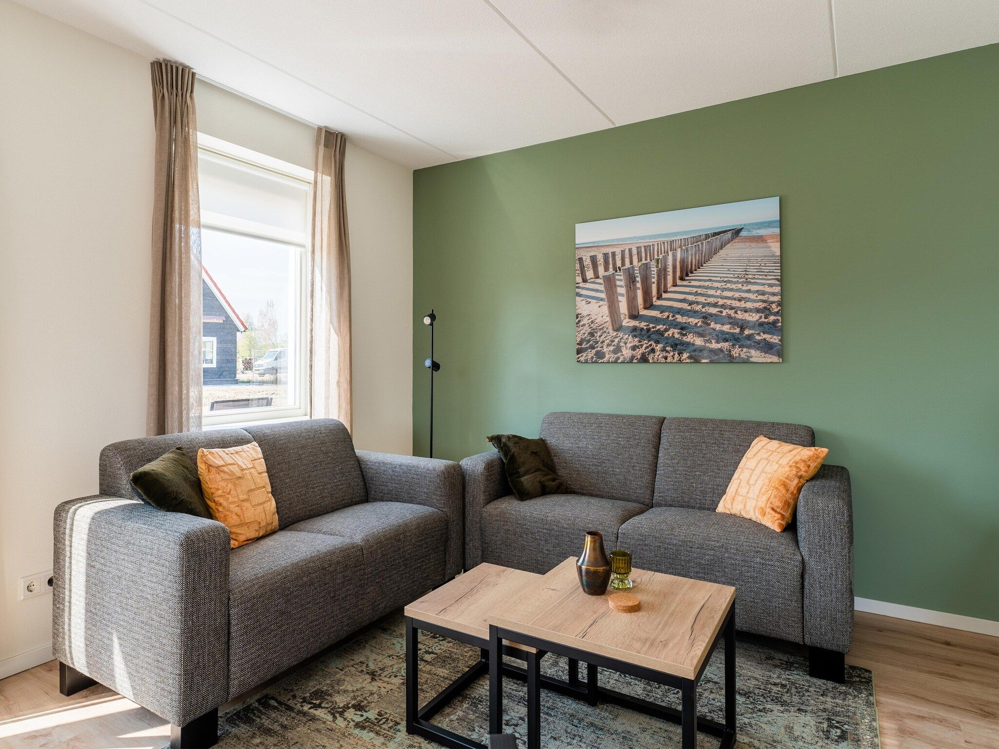 De woonkamer van De Tjiftjaf Huis Nr 21 in Scherpenisse