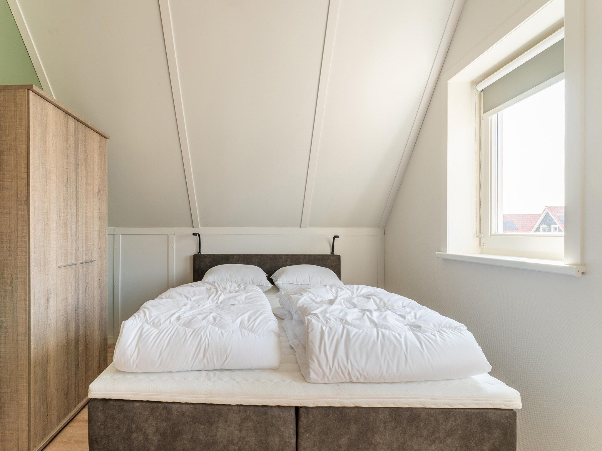 Een slaapkamer van De Tjiftjaf Huis Nr 21 in Scherpenisse