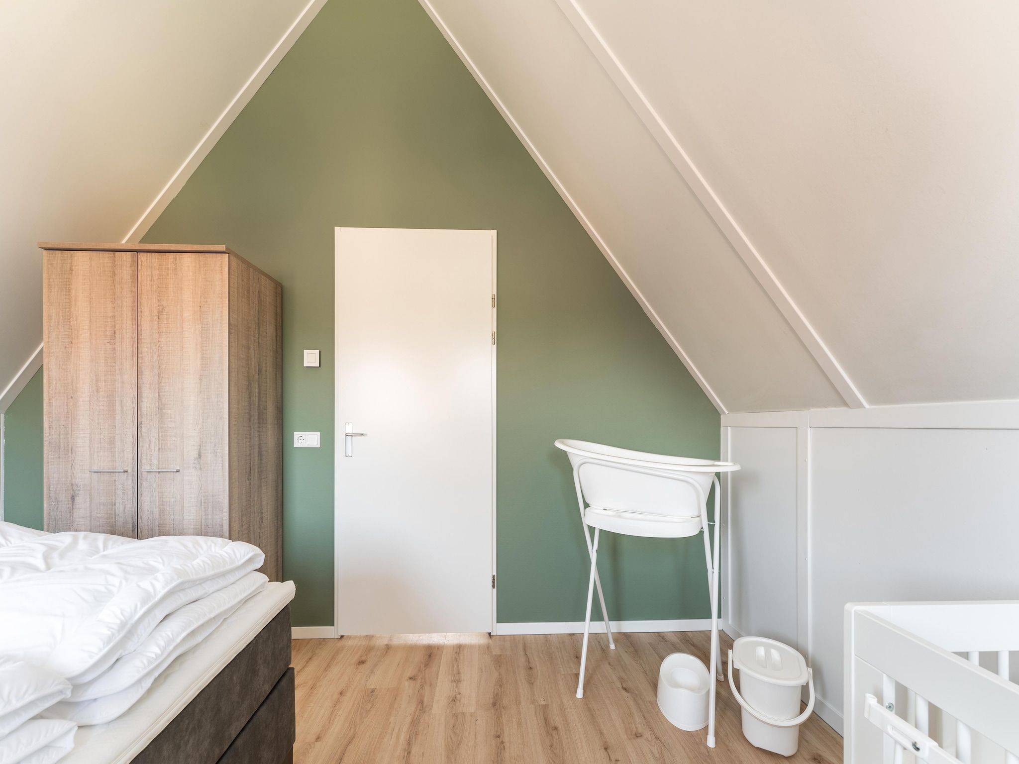 Een slaapkamer van De Tjiftjaf Huis Nr 21 in Scherpenisse