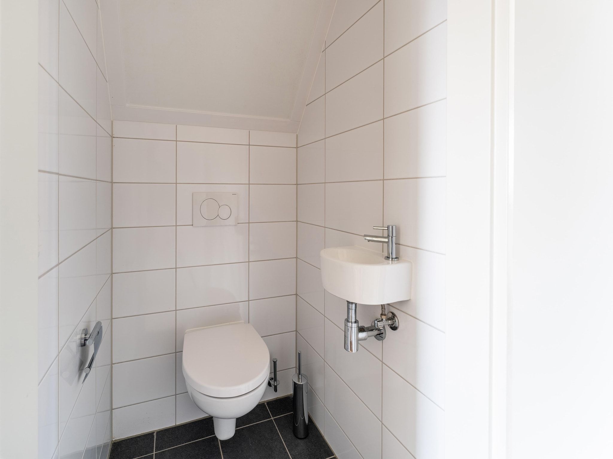 De badkamer van De Tjiftjaf Huis Nr 21 in Scherpenisse