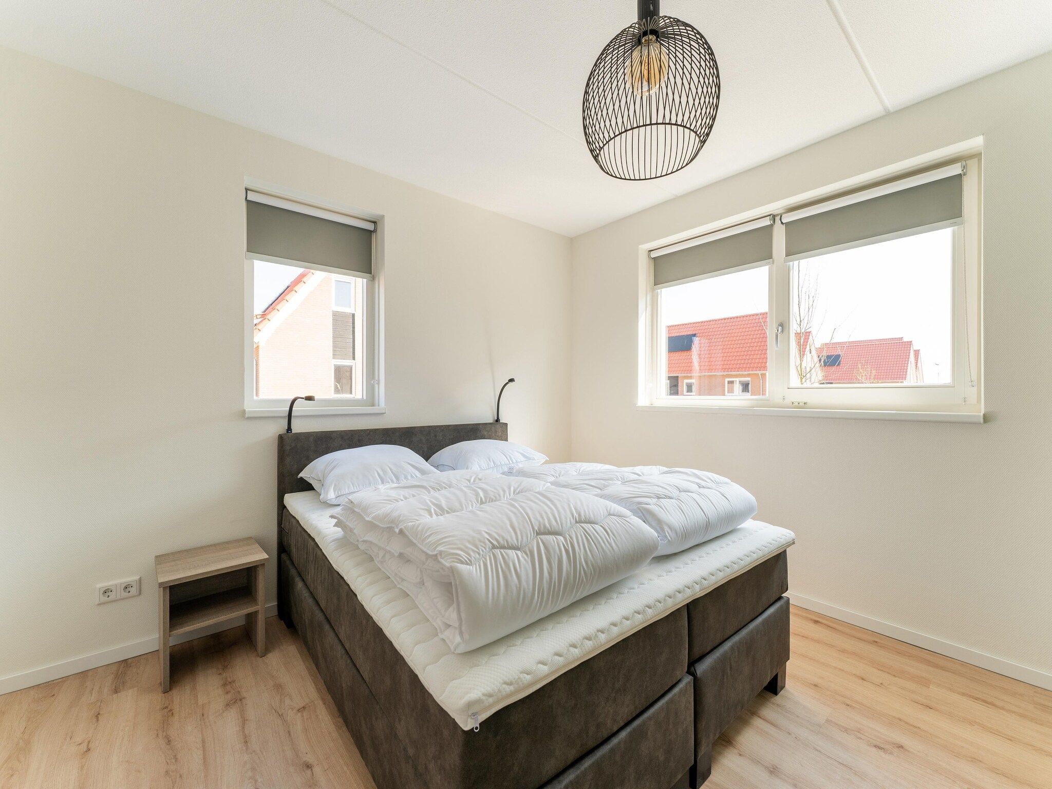 Een slaapkamer van De Tjiftjaf Huis Nr 21 in Scherpenisse