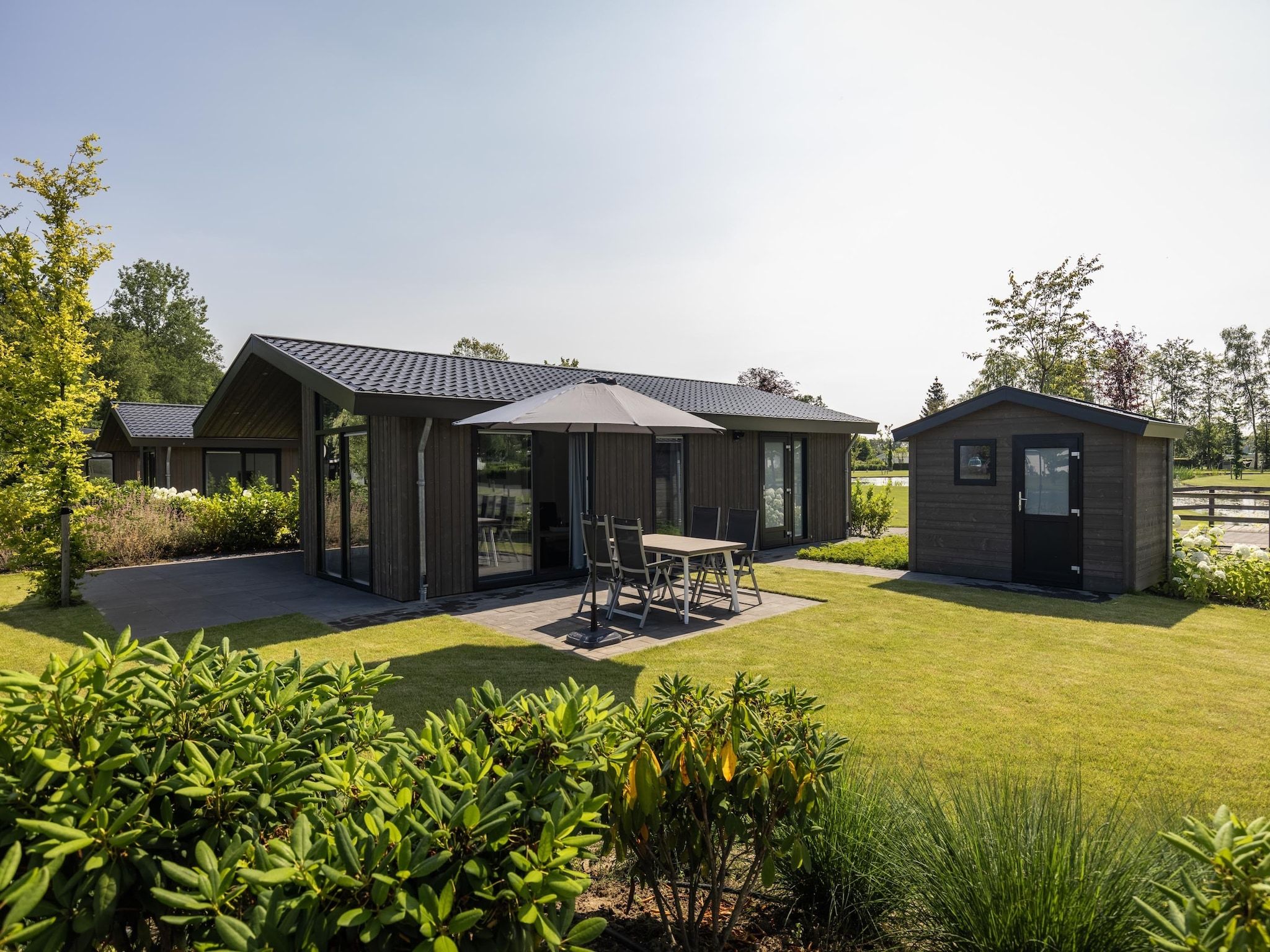 De tuin van Vakantiepark Molenvelden 3 in Veldhoven