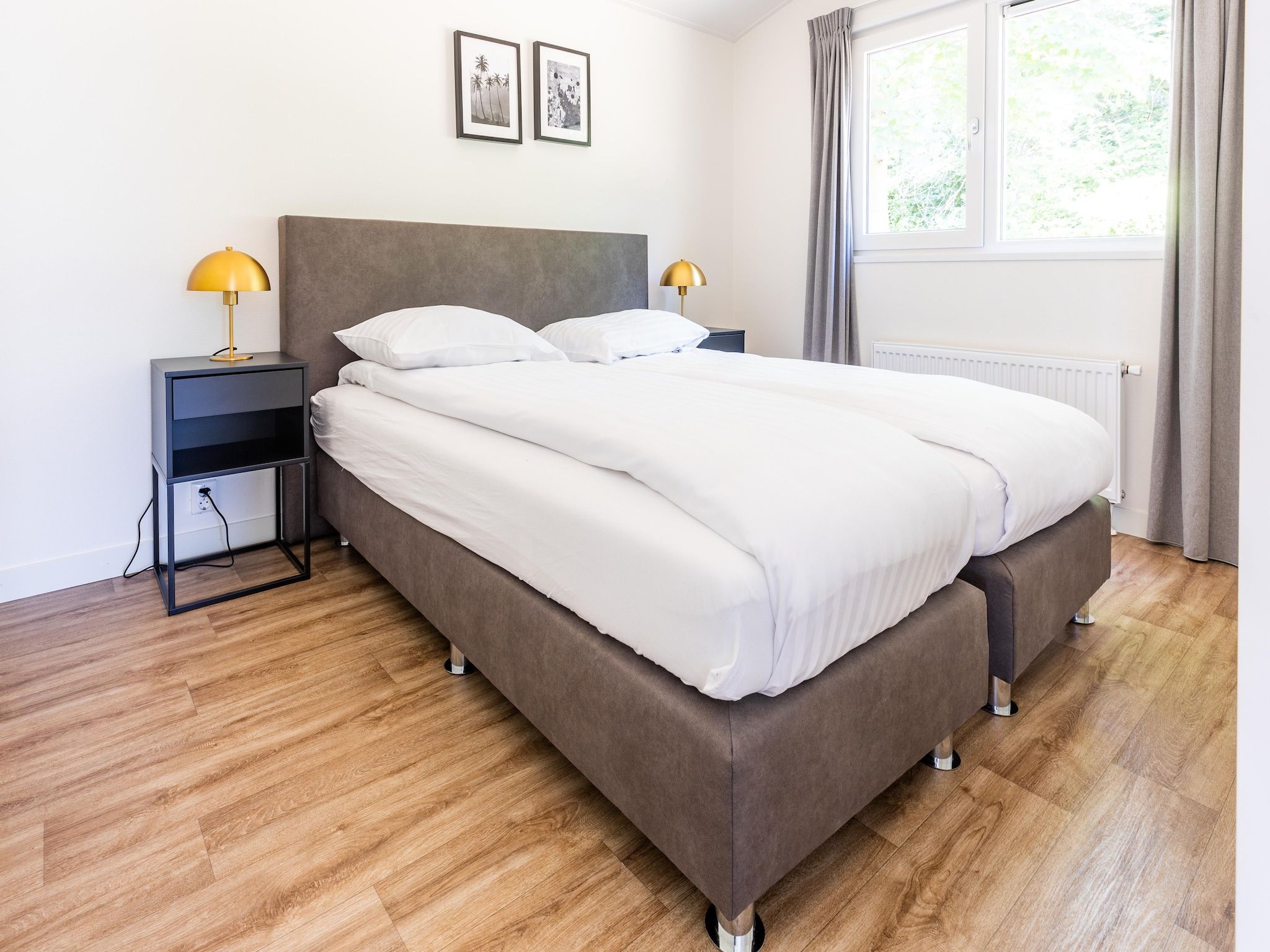 Een slaapkamer van Vakantiepark Molenvelden 6 in Veldhoven