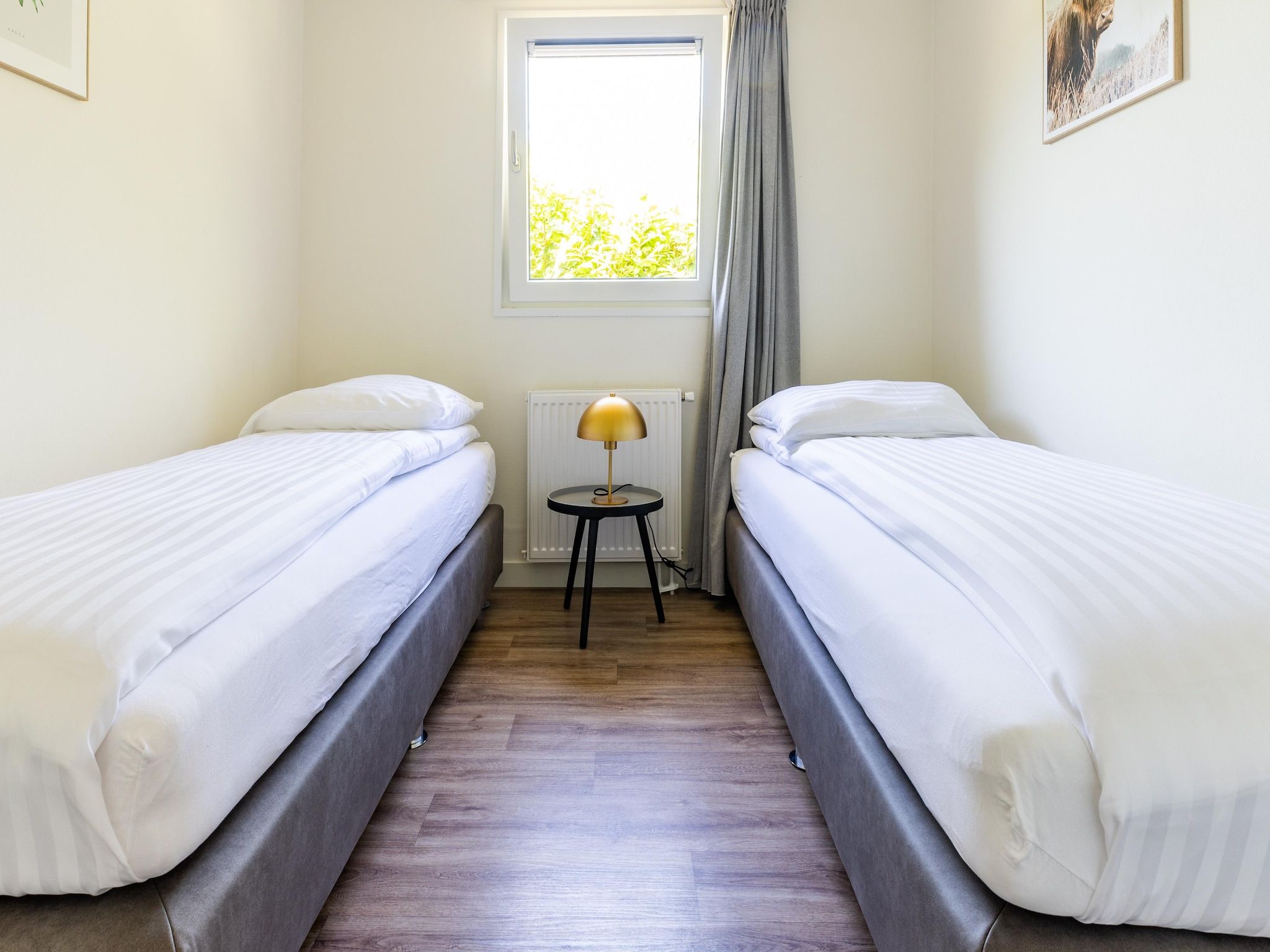 Een slaapkamer van Vakantiepark Molenvelden 6 in Veldhoven
