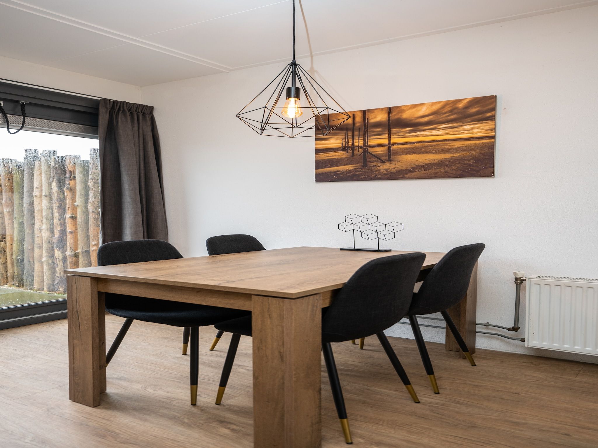 De woonkamer van Vakantiepark 't Eibernest Texel 1 in De Cocksdorp