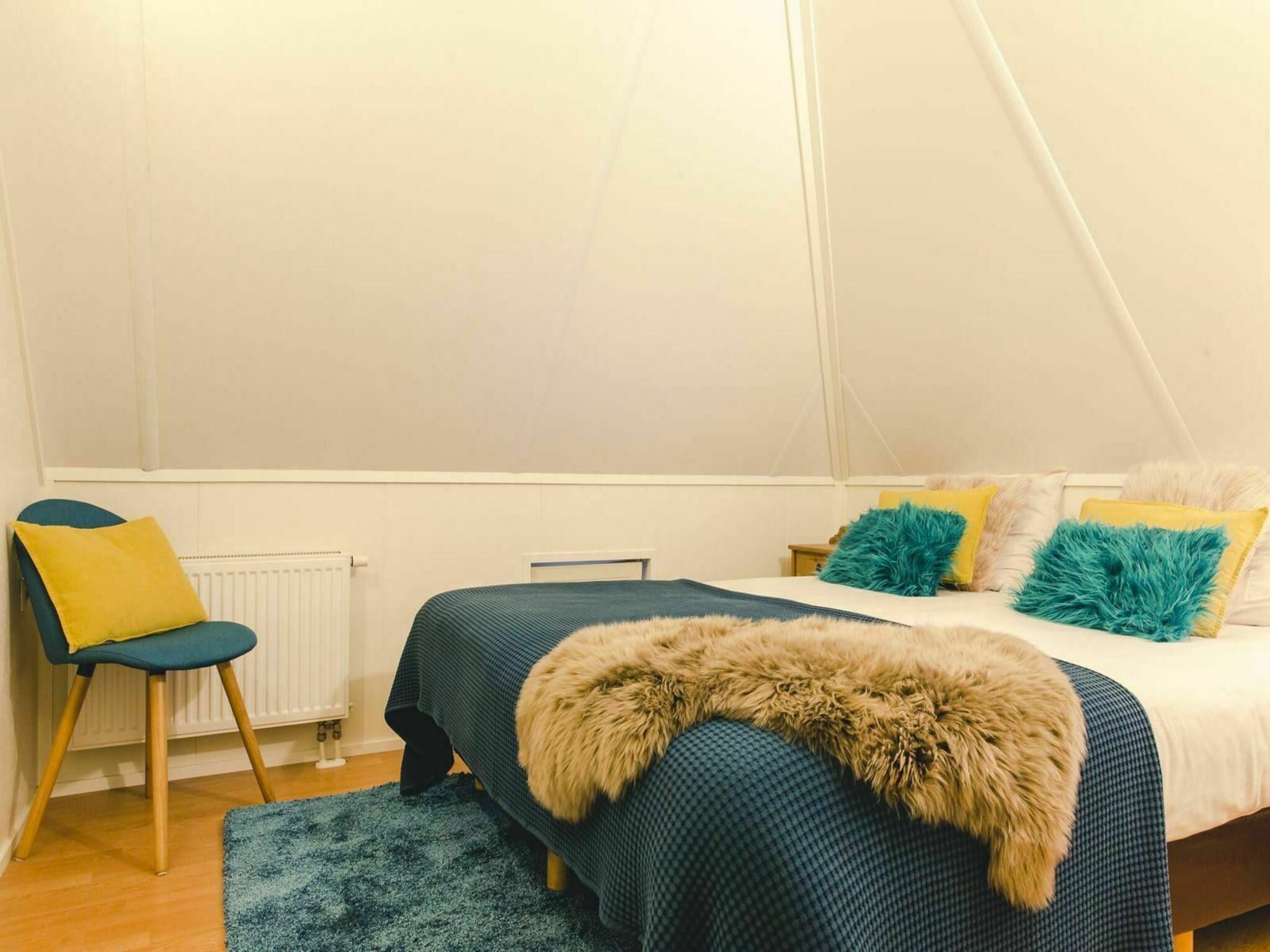 Een slaapkamer van Vakantiepark Mölke 29 in Zuna