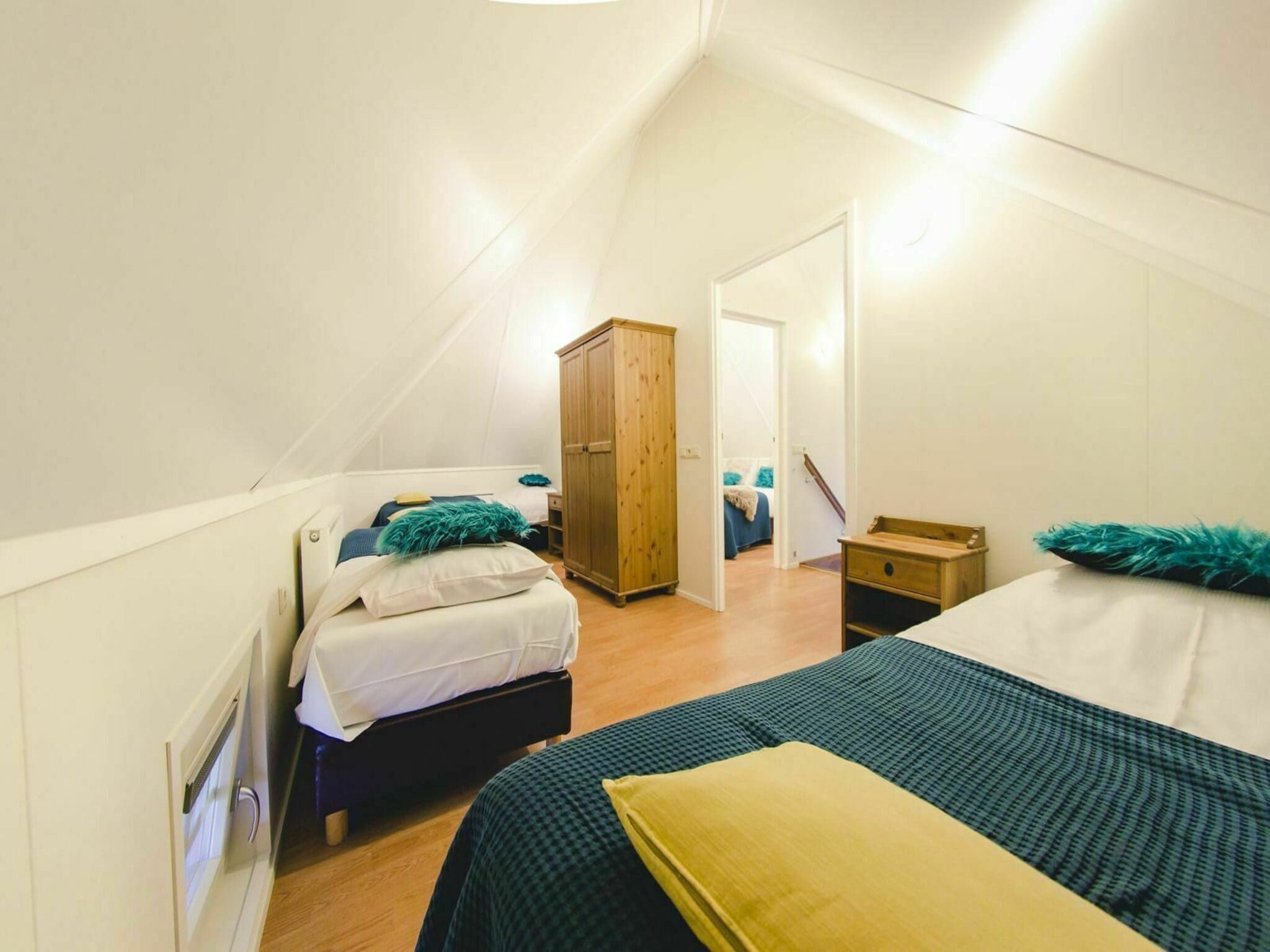 Een slaapkamer van Vakantiepark Mölke 29 in Zuna