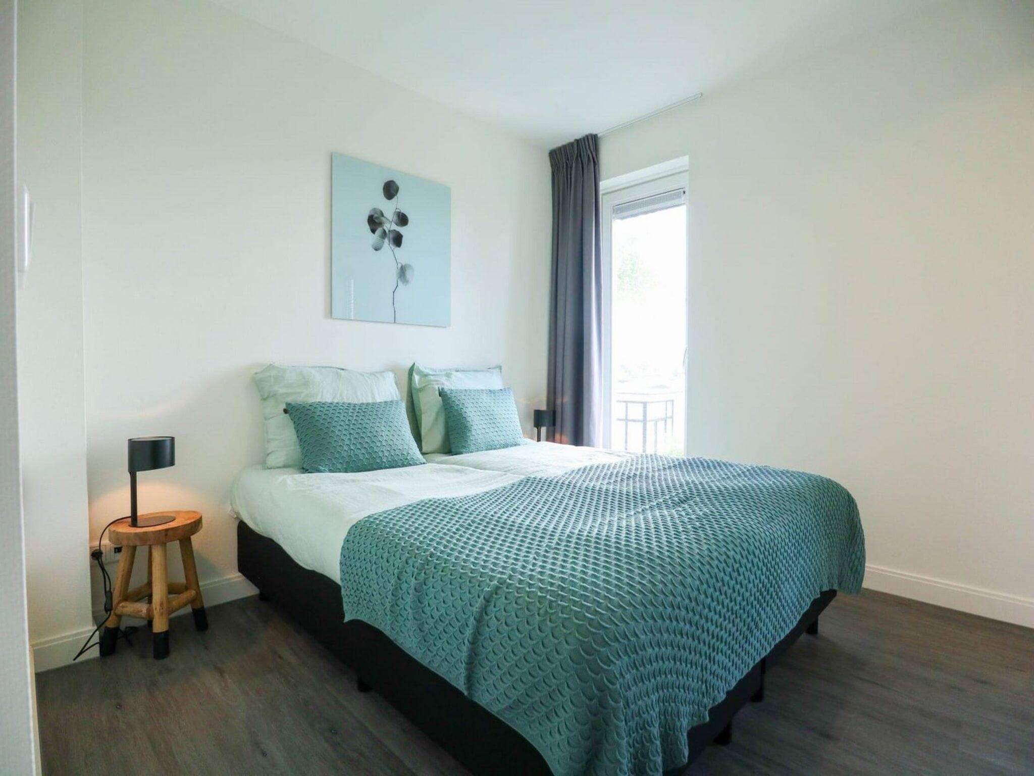 Een slaapkamer van Villa Meerzicht 8 in Nijkerk