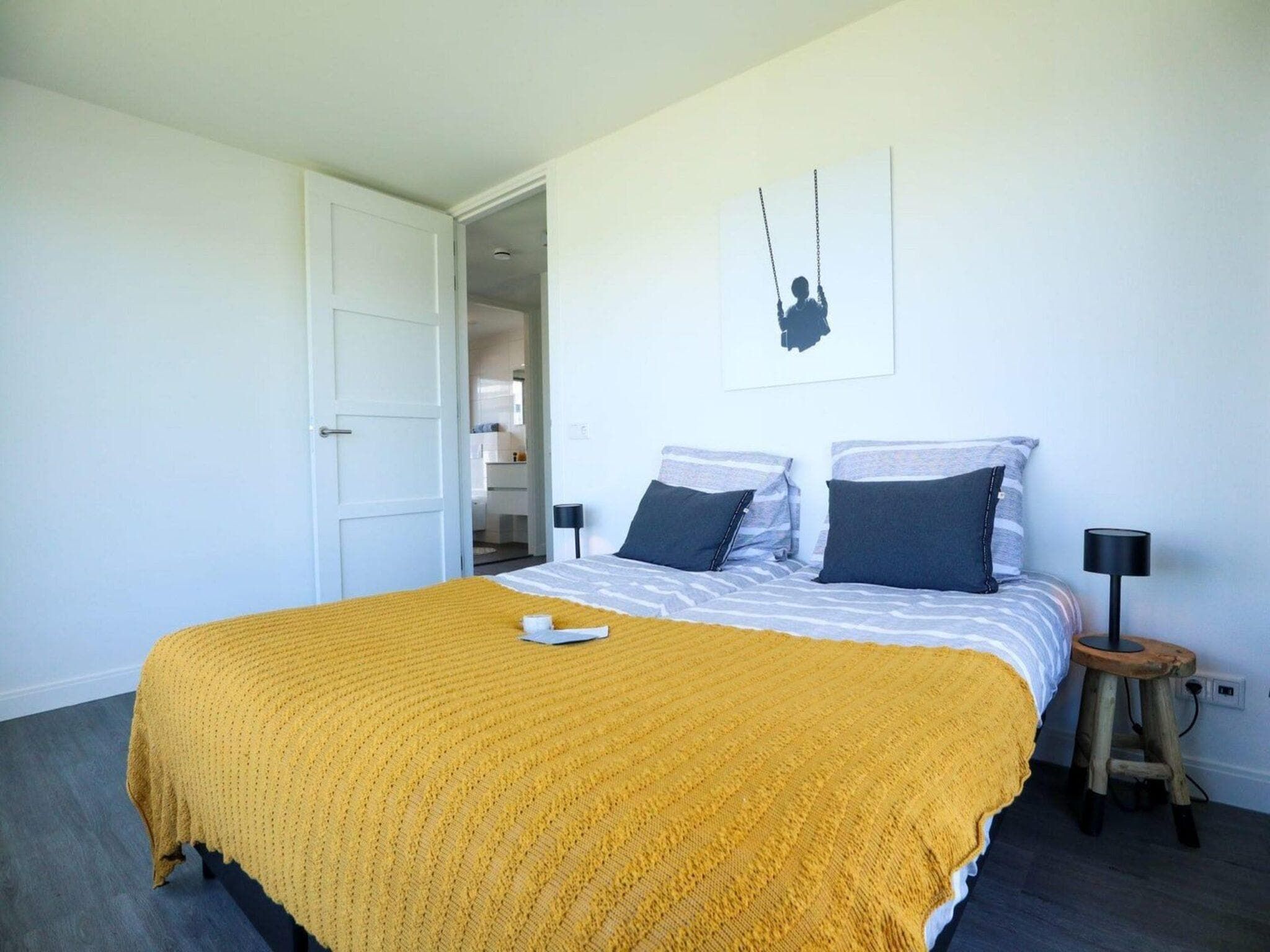 Een slaapkamer van Villa Meerzicht 8 in Nijkerk