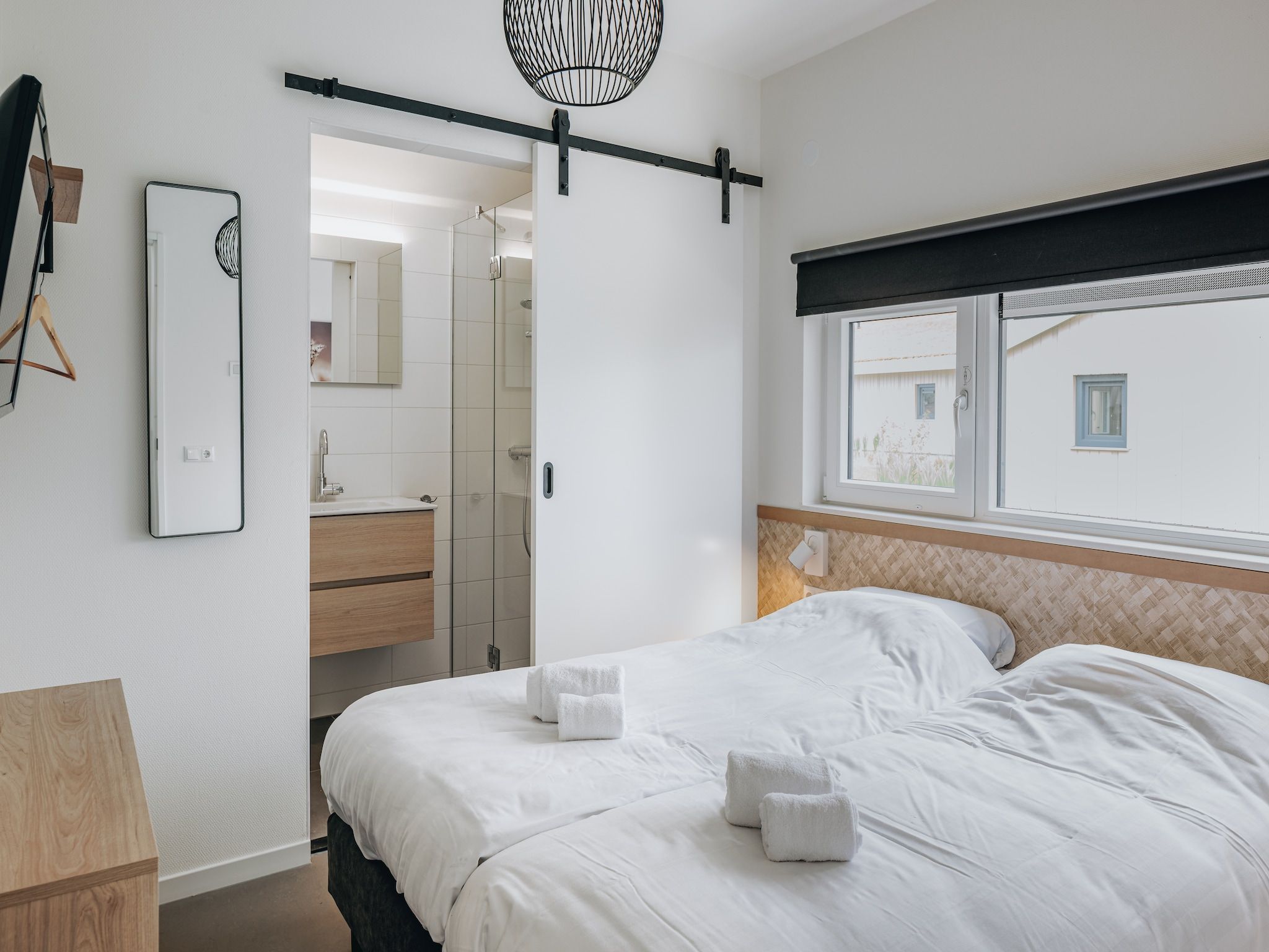 Een slaapkamer van Vakantiepark Zeebad 12 in Breskens