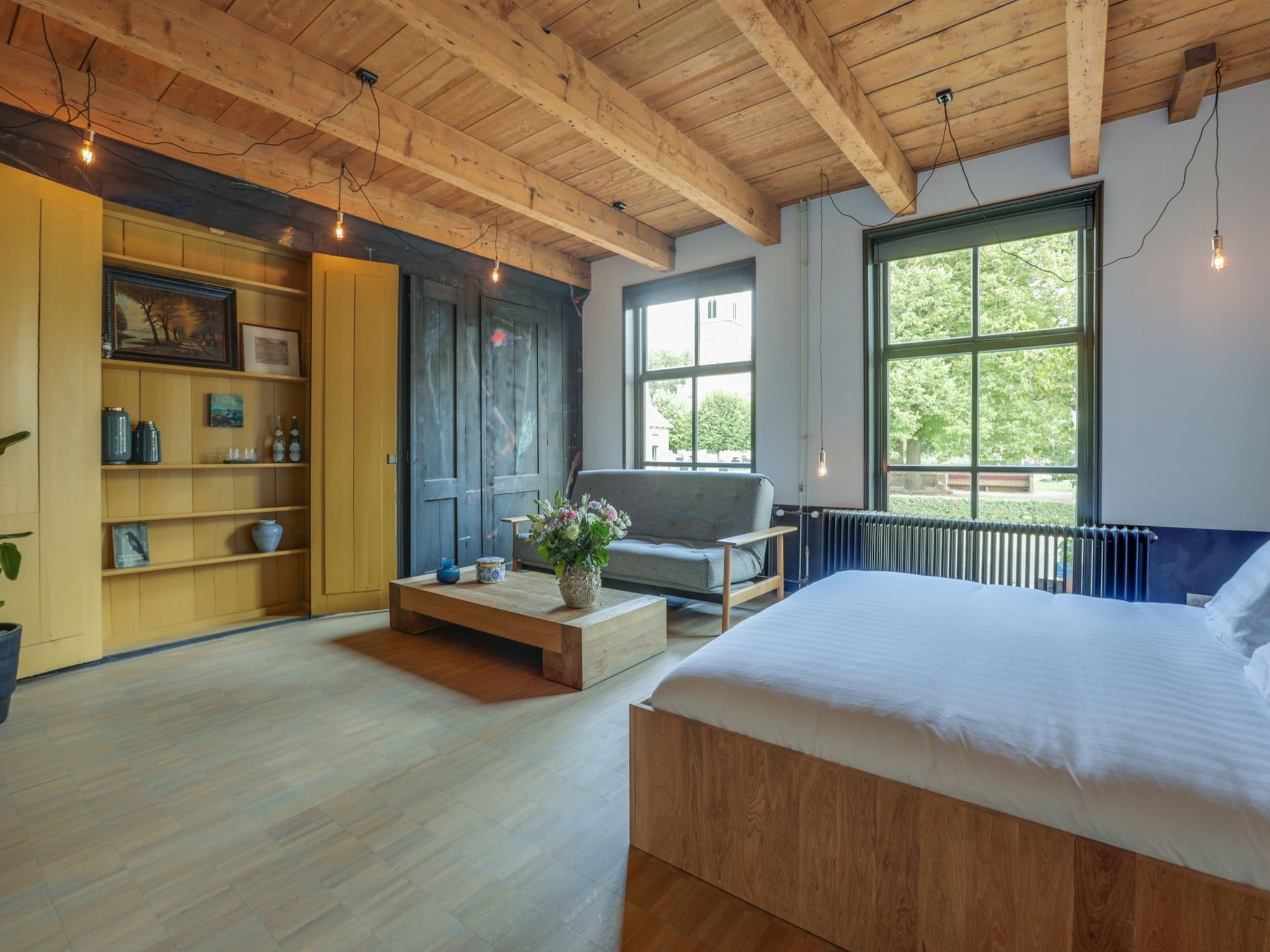 Een slaapkamer van 'Herberg De Waard van Ternaard' in Ternaard