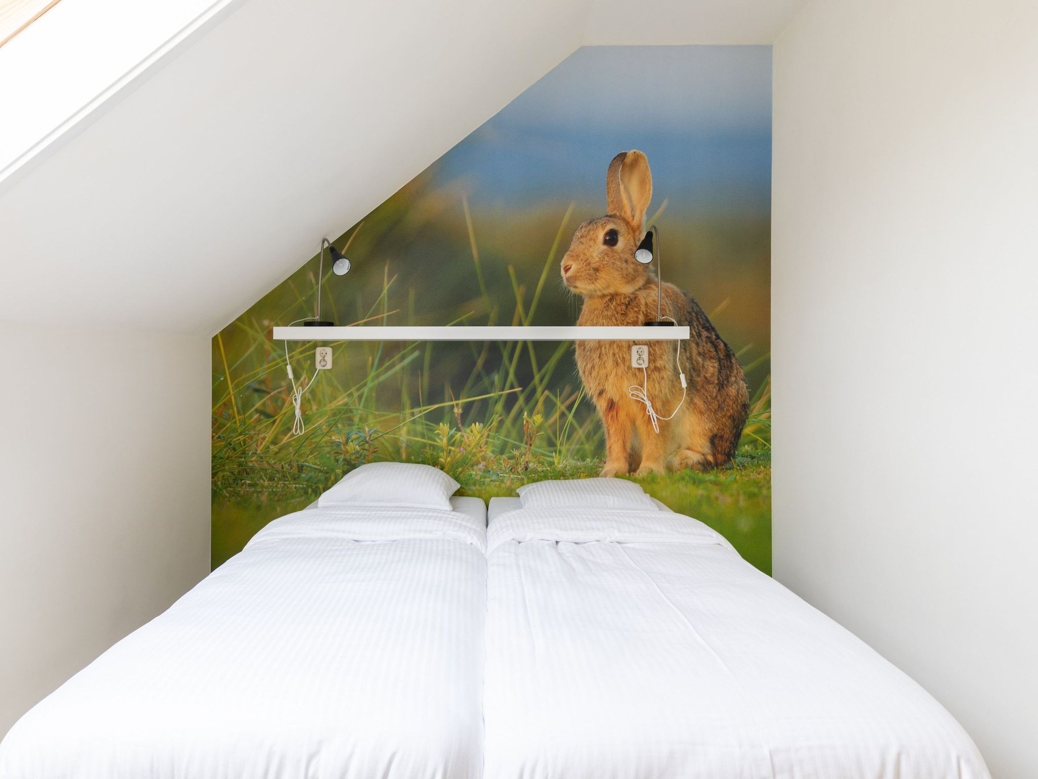 Een slaapkamer van Combi Vrijersduin en Kaapsduin in Nes