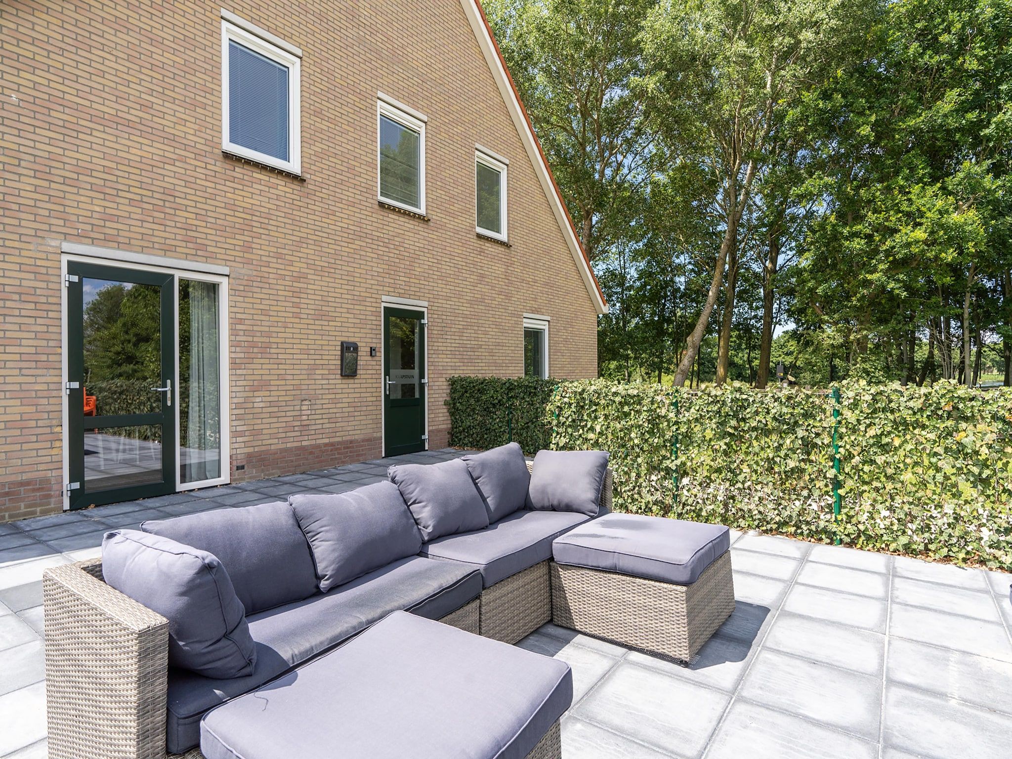 De tuin van Combi Vrijersduin en Kaapsduin in Nes