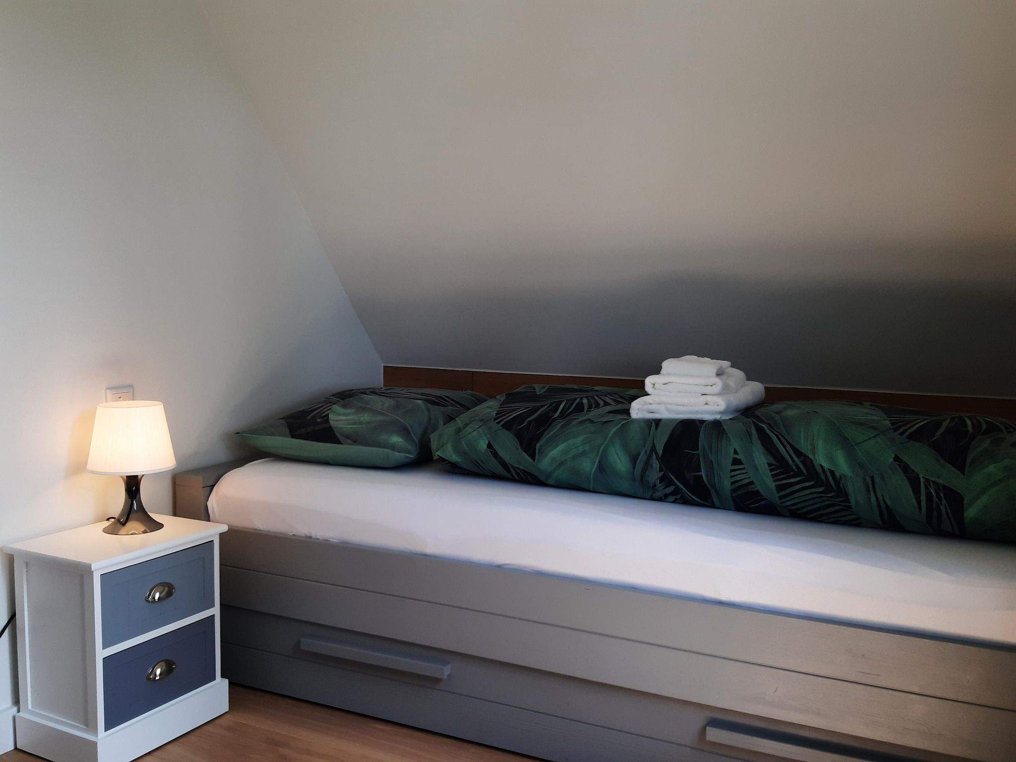 Een slaapkamer van Vakantiehuis DJEZ in Tuitjenhorn